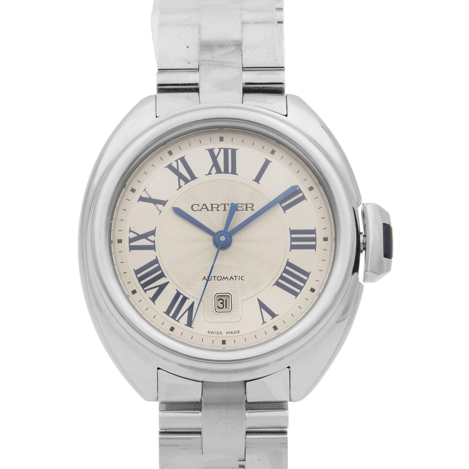 This never been worn Cartier Cle De Cartier WSCL0005 is a beautiful Ladie's timepiece that is powered by mechanical (automatic) movement which is cased in a stainless steel case. It has a round shape face, date indicator dial and has roman numerals