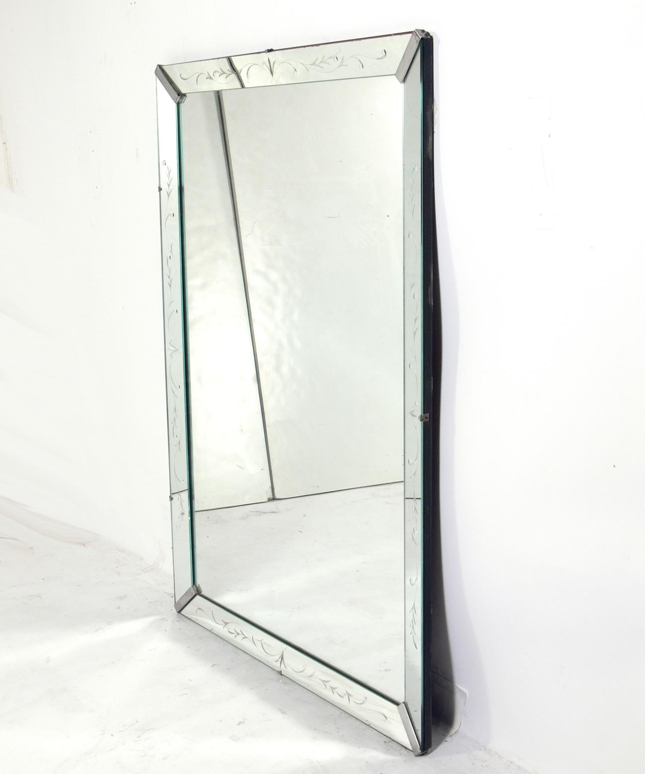 Clean lined mirror with nickel fittings, American, circa 1940s. It can be mounted vertically or horizontally.