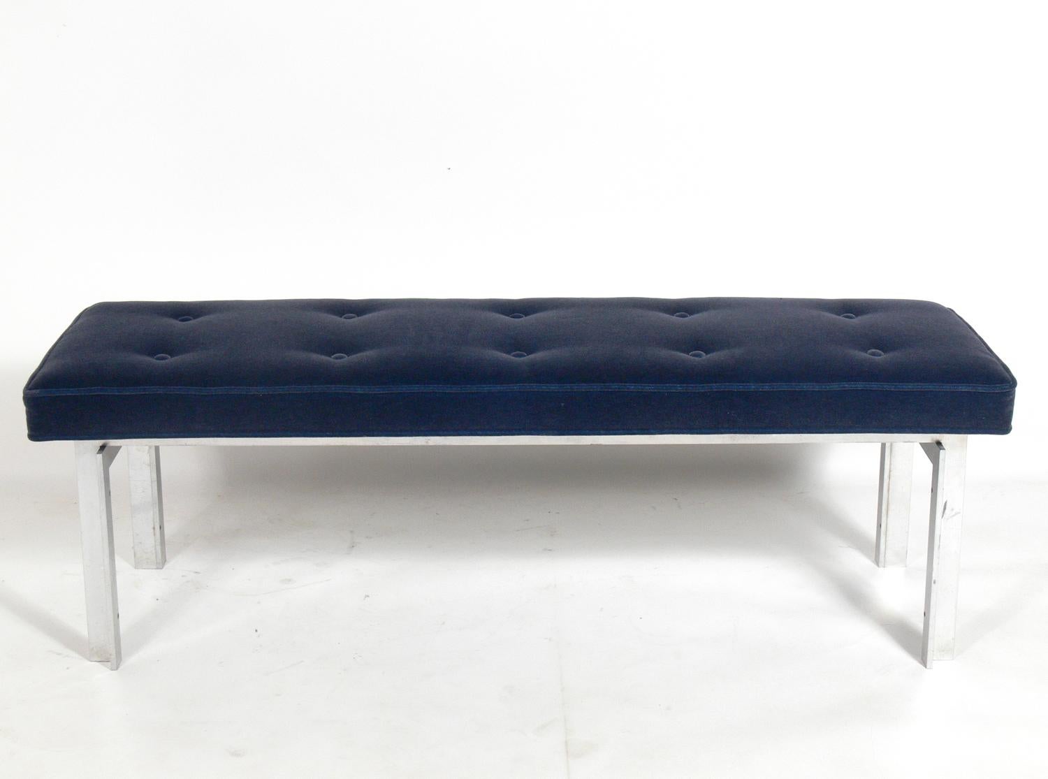 Clean lined aluminum bench designed by Paul Mayen for Habitat, England, circa 1970s. It has been reupholstered in a plush navy blue velvet.
