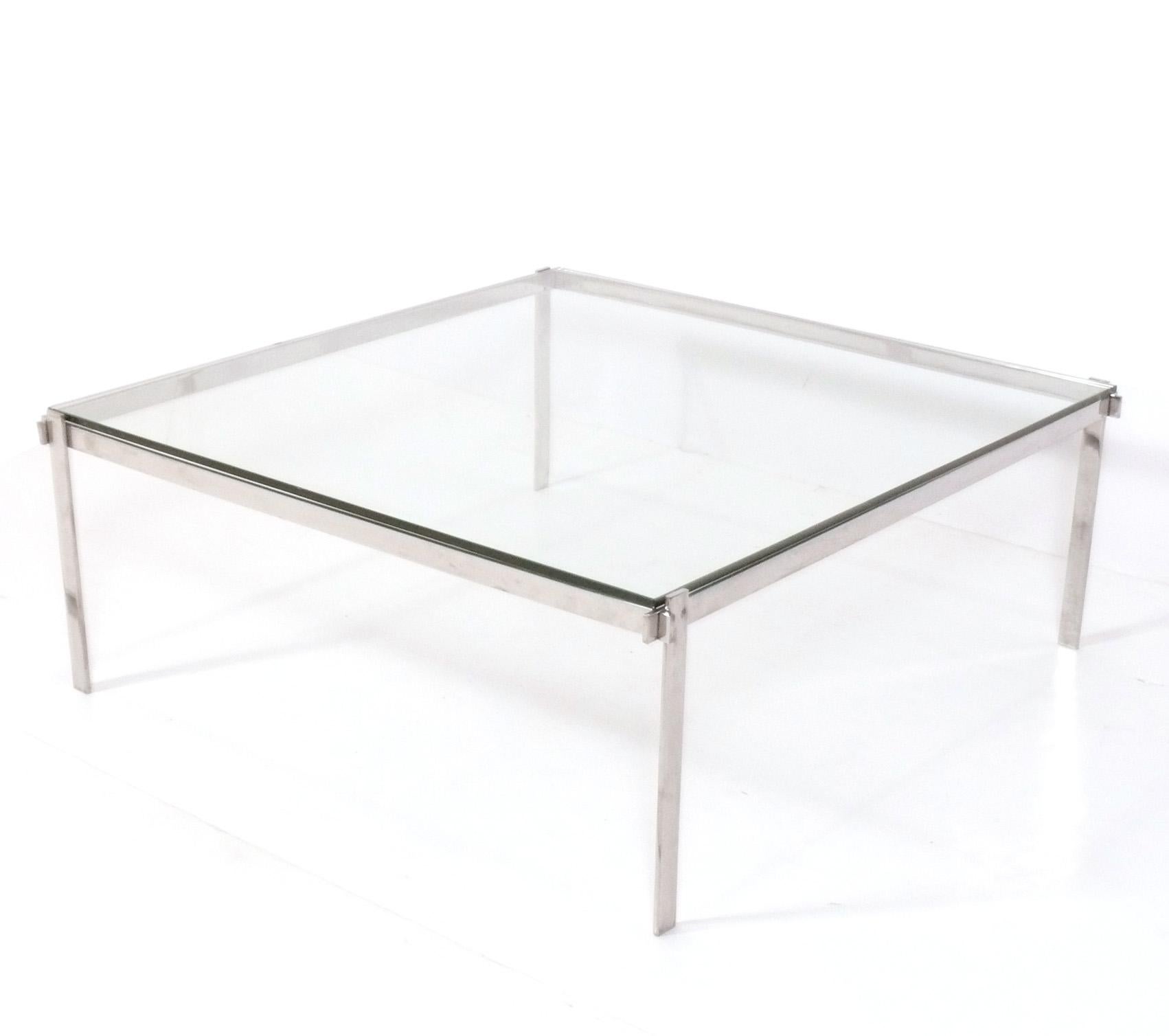 Clean Lined Architectural Chrome Coffee Table, in the manner of Poul Kjaerholm, probably American, circa 1960s. It has a low slung form with simple clean lined joinery.