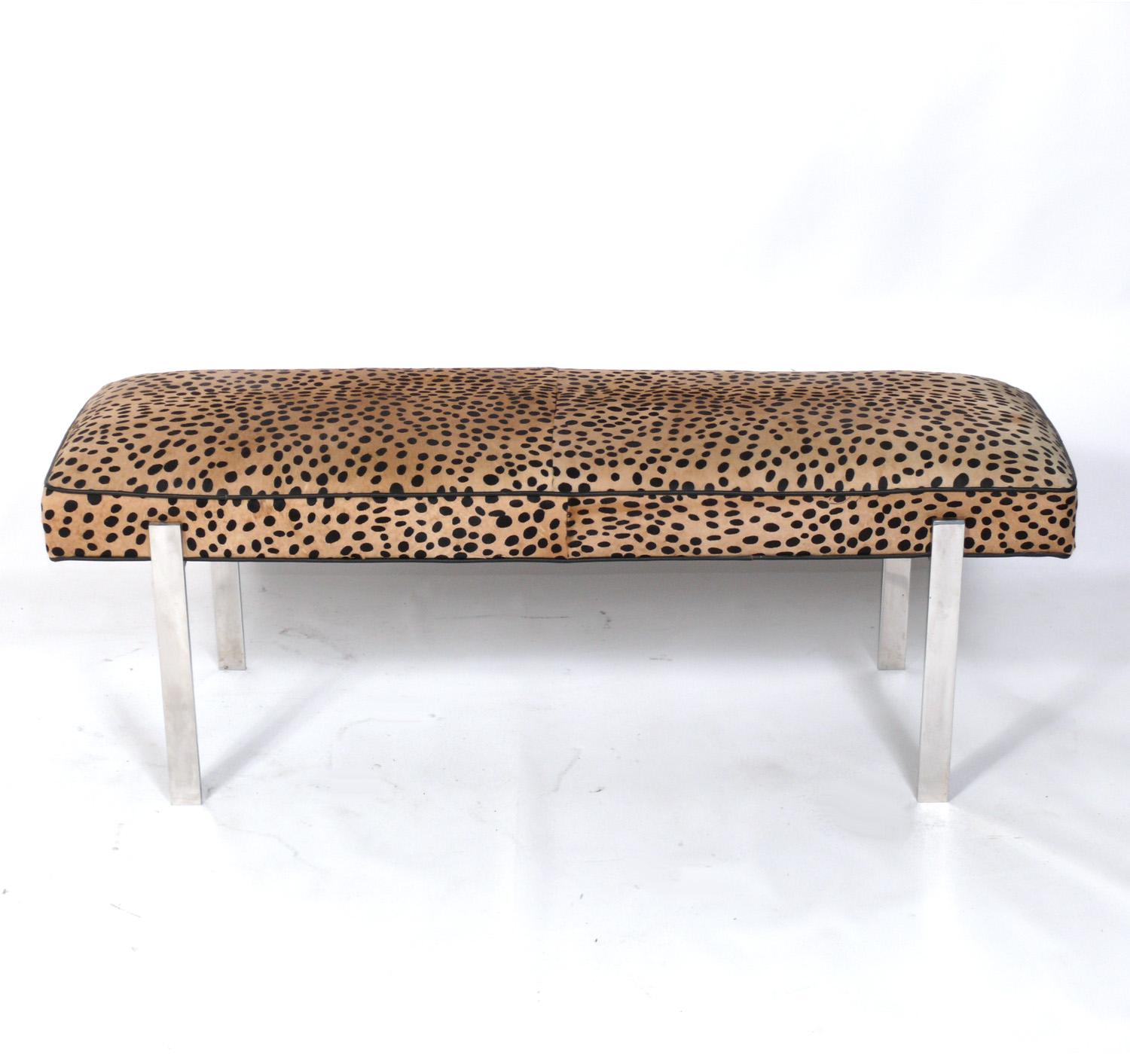 Clean Lined Chrome bench, circa 1980s. High quality construction with heavyweight chrome frame and faux cheetah print hair on hide upholstery.