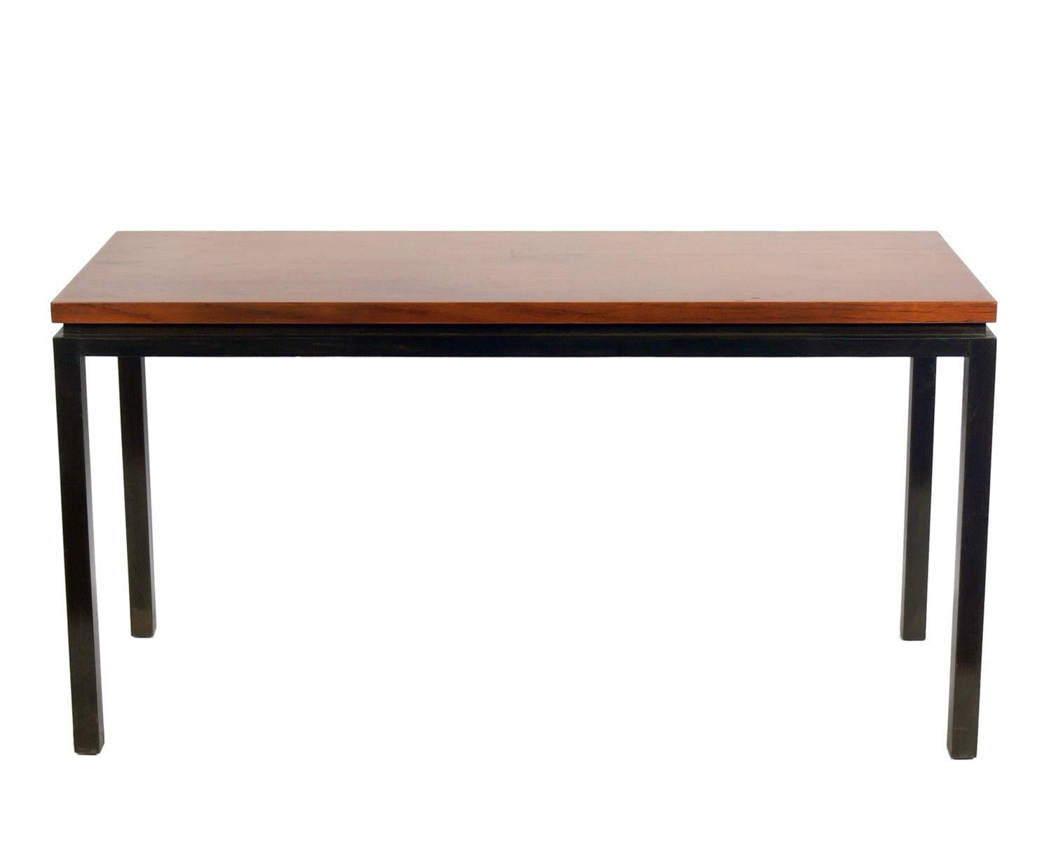 Clean lined console table, designed by Edward Wormley for Dunbar, American, circa 1960s. This table is a versatile size and can be used as a console or sofa table, or as a desk, bar, or media center. This piece is currently being refinished and can