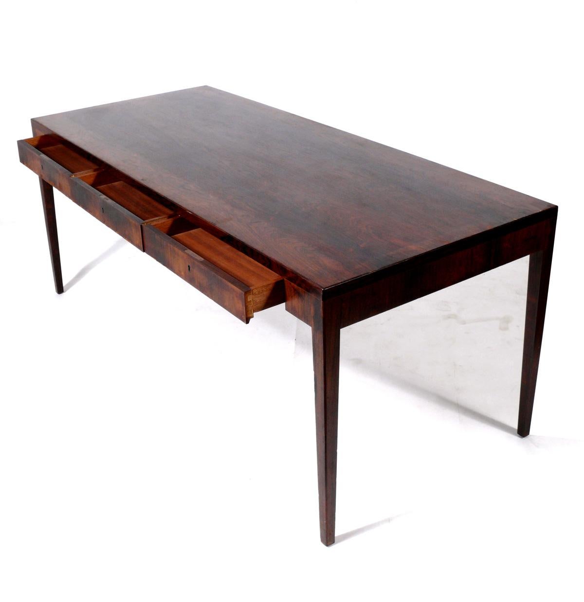 Mid-Century Modern Clean Lined Danish Modern Rosewood Desk by Riis Antonsen