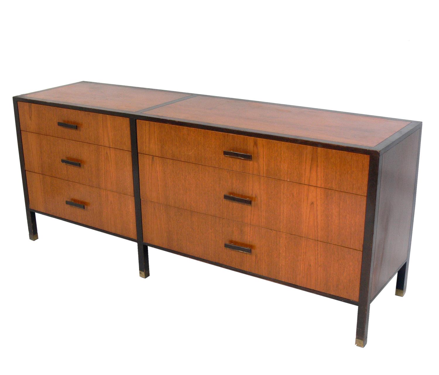 Clean lined rosewood and mahogany chest, designed by Harvey Probber, American, circa 1960s. It offers a voluminous amount of storage with six deep drawers. It is a versatile size and can be used in a bedroom as a chest or dresser, or in a living