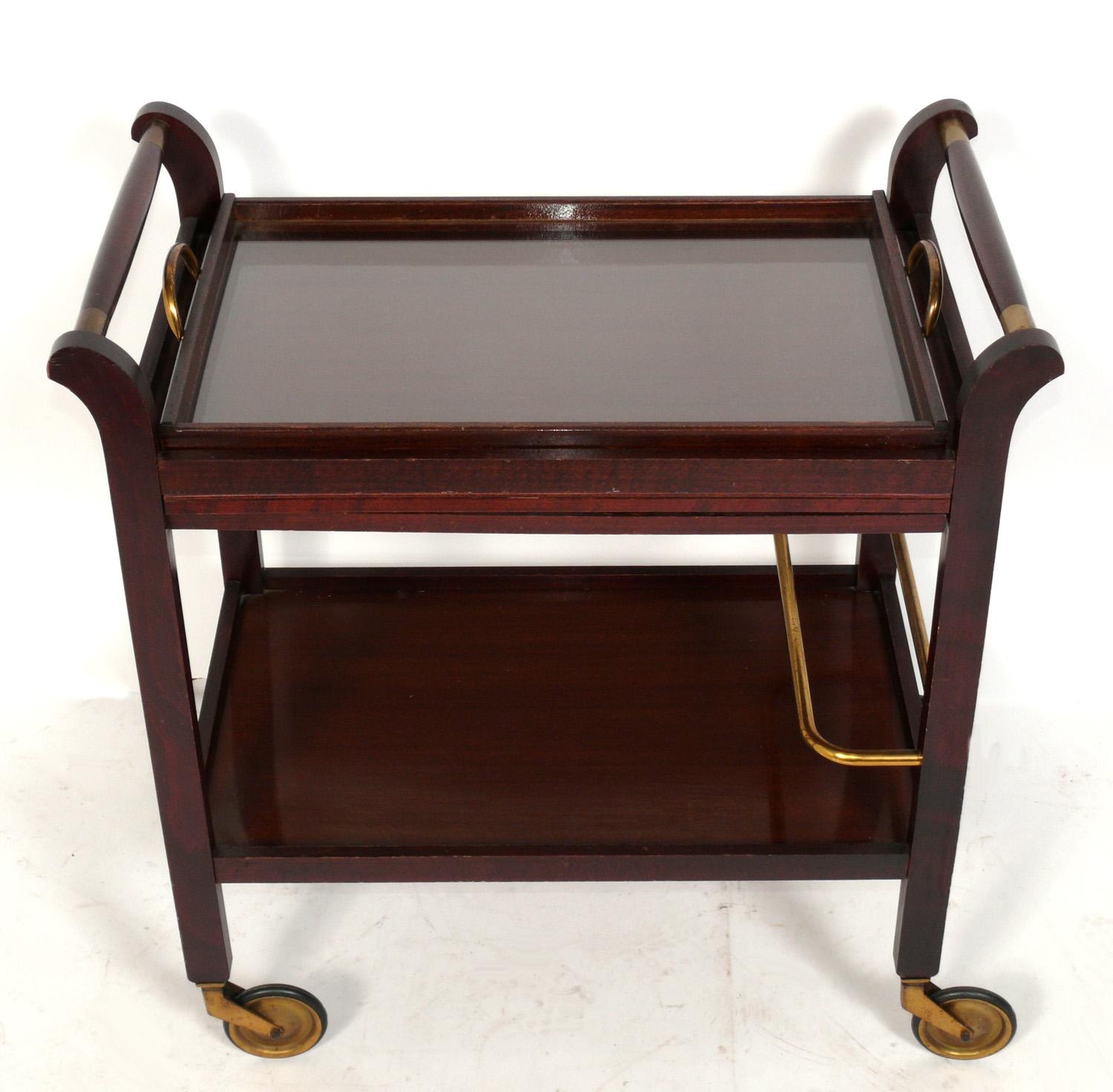 Clean lined Italian bar cart, Italy, circa 1950s. Retain original removable serving tray.