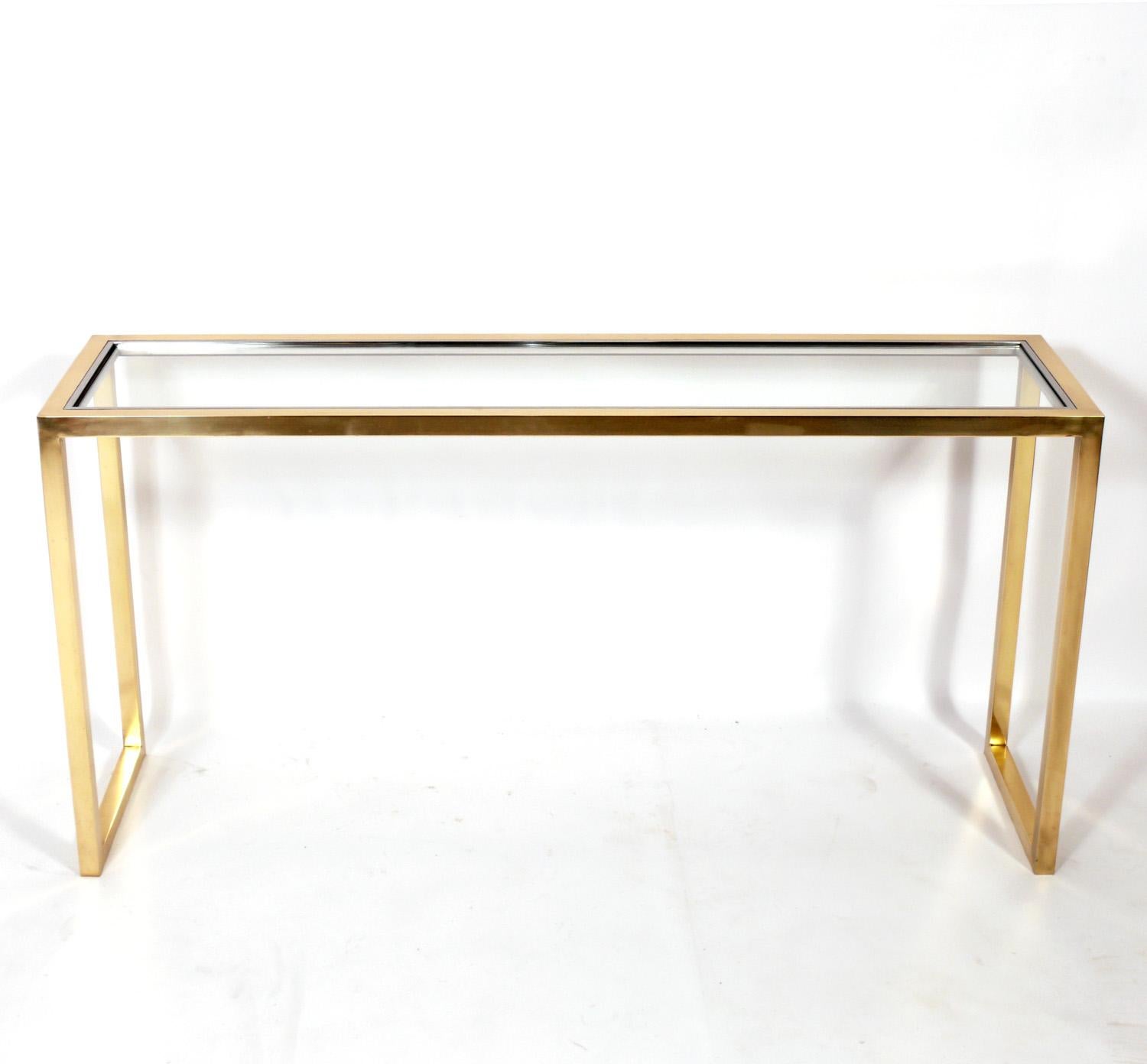 Clean lined modern console or sofa table, American, circa 1980s. This table is a versatile size and can be used as a console table, sofa table, desk, or vanity.