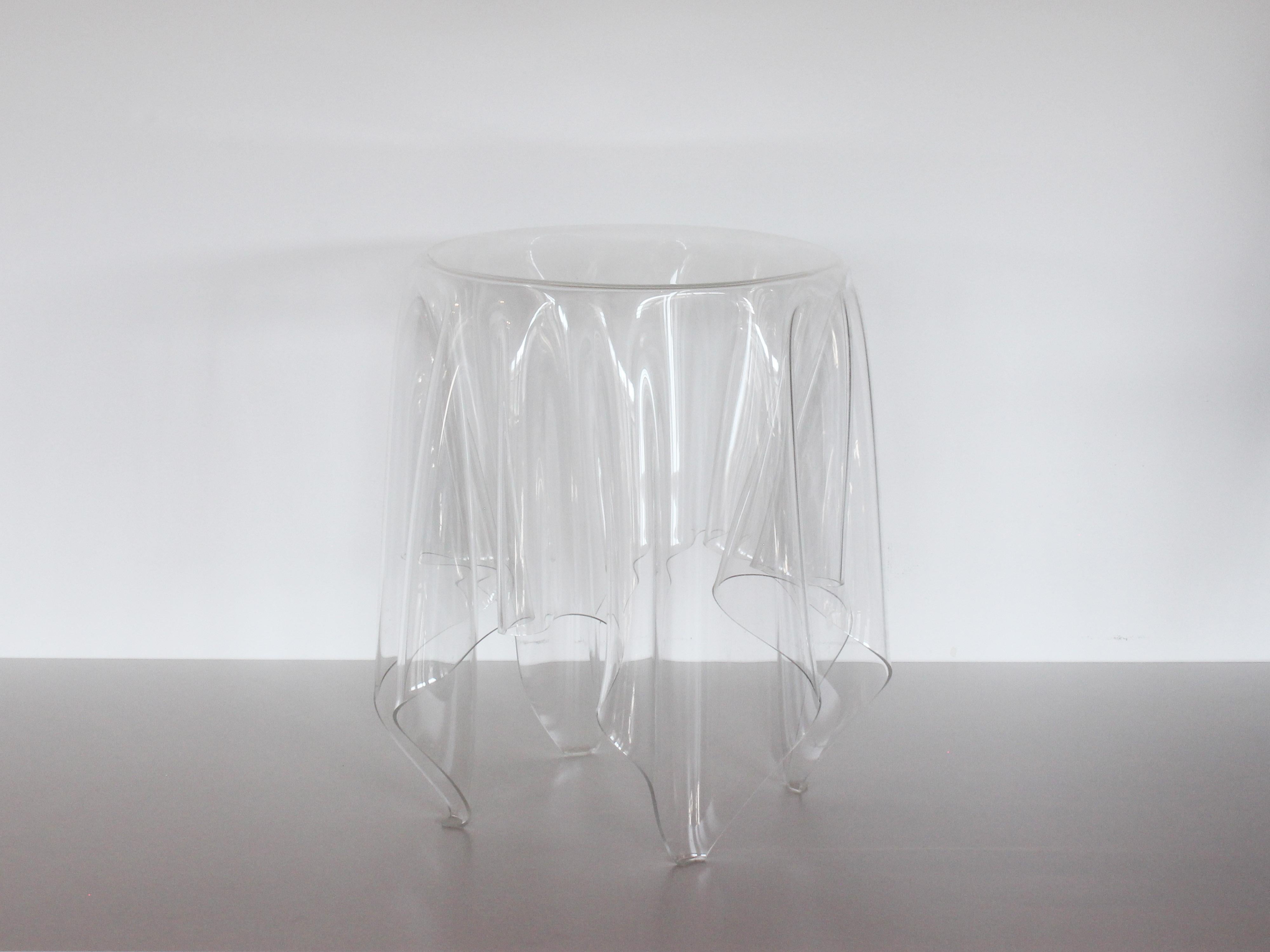 Handmade Illusion side table, designed by John Brauer for Essey. Made of clear acrylic (3 mm Acryl / PMMA), the invisible object gives the impression of a tablecloth floating in the air. 

