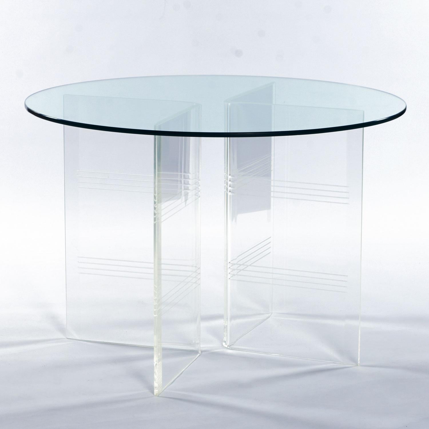 A brand new 48? diameter, 3/8? thick tempered glass top will ship with the table when purchased online. Let us know if you prefer to buy the bases alone, without glass. This listing is for the table alone. The chairs in the photos are NOT included