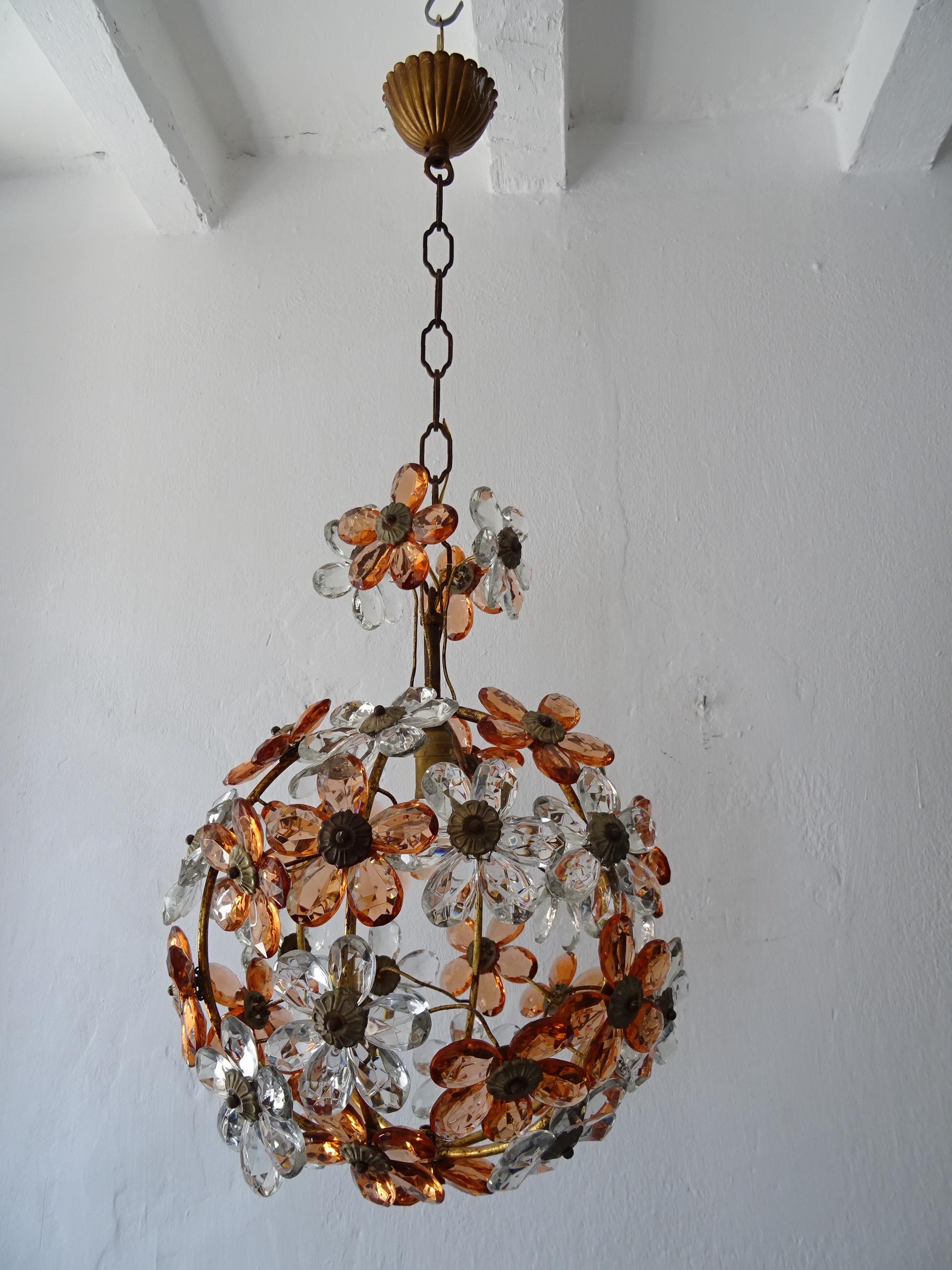 Housing one light. Will be newly rewired with a certified US UL socket for the USA and appropriate socket for all other countries and ready to hang. Clear and peach crystal prisms made into flowers. (Not amber, some pictures look darker using flash)