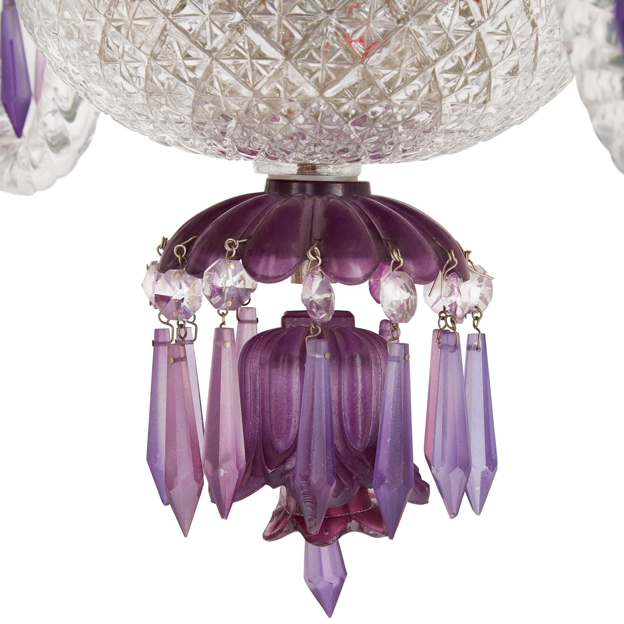 Clear and purple cut-glass chandelier in the Belle Époque style 
Continental, 20th Century
Height 74cm, diameter 76cm

This opulent chandelier is crafted in the lavish Belle Époque style, which dominated French design at the turn of the 20th