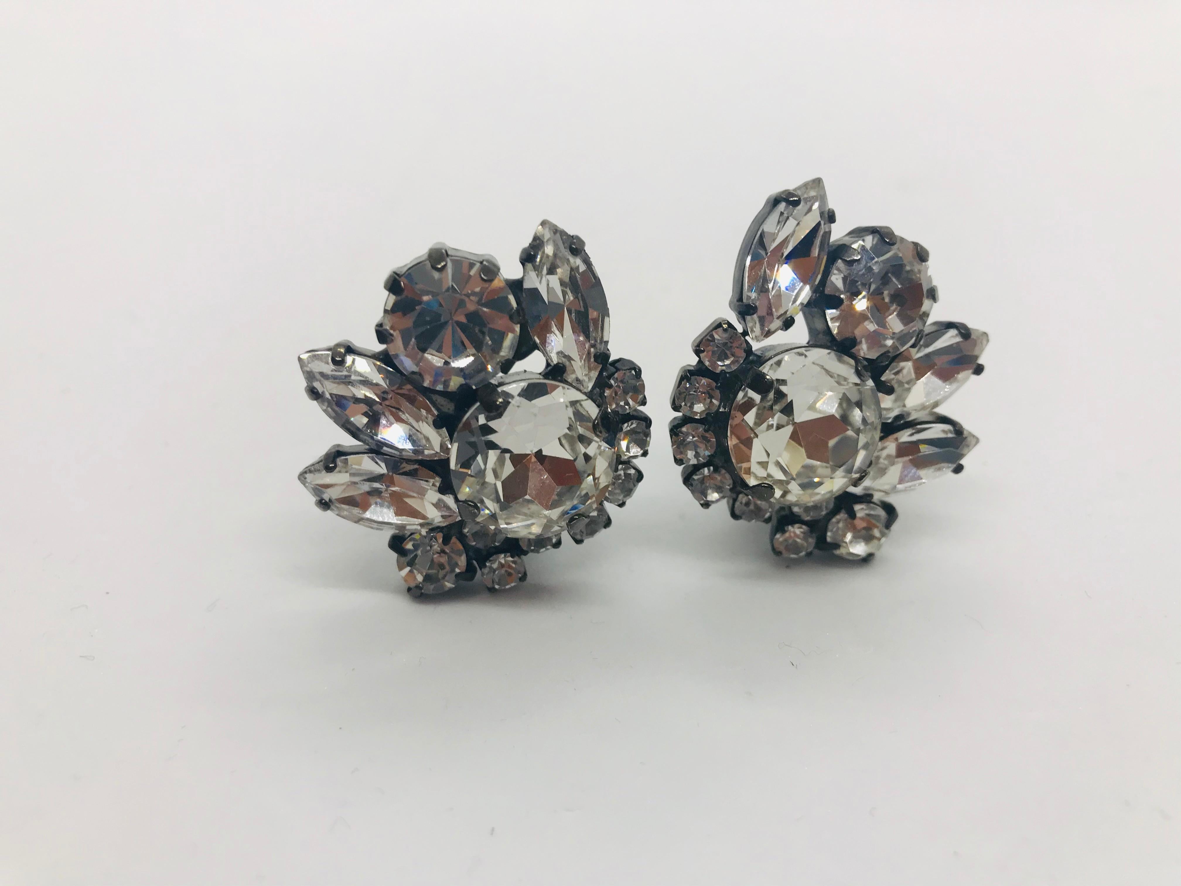 Our classic clear Austrian crystal vintage 1960's Swarovski button cluster earrings are a perfect choice for any wardrobe.  These earrings can be worn from morning til evening.  These earrings feature clear vintage 1960's round and marquis shaped