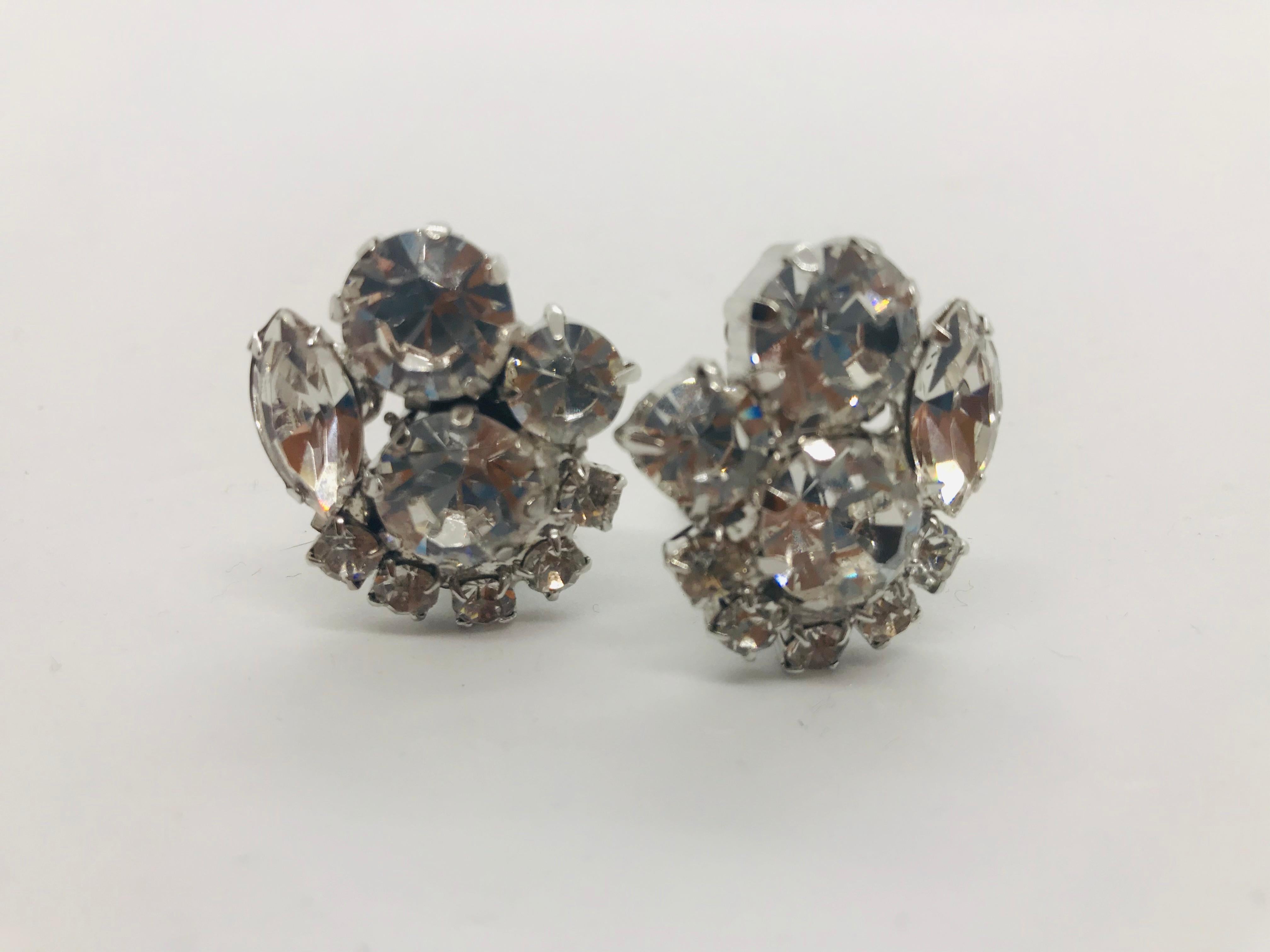 One of the most versatile pieces of jewelry to wear are our classic clear Austrian crystal button cluster clip earrings.  These earrings are perfect to wear from daytime into evening no matter the occasion.  They feature round clear Austrian