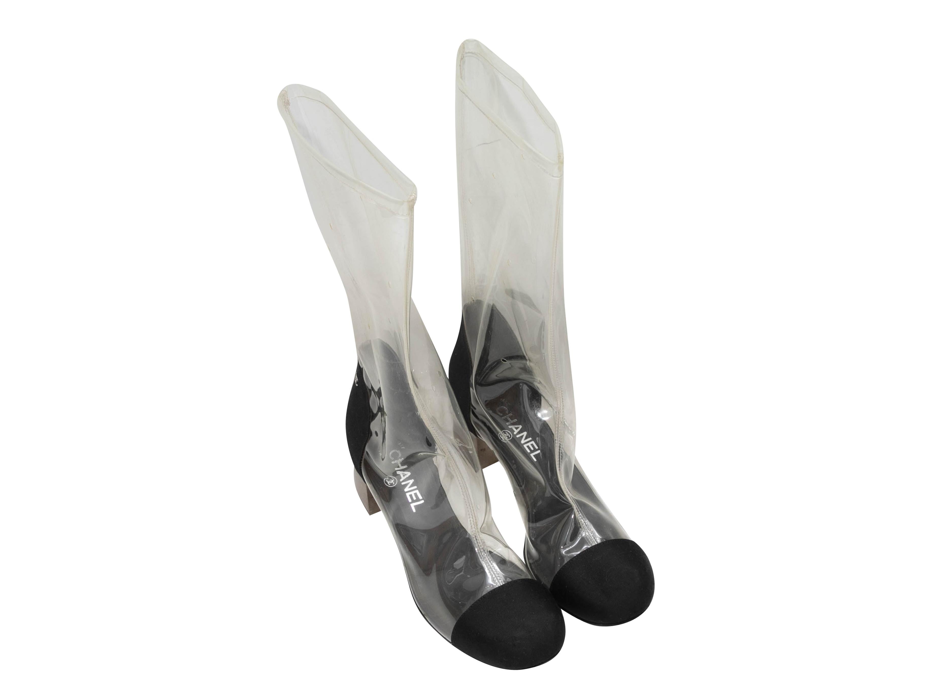 Clear PVC and black grosgrain cap-toe boots by Chanel. Circa 2018. Lucite block heels. 11