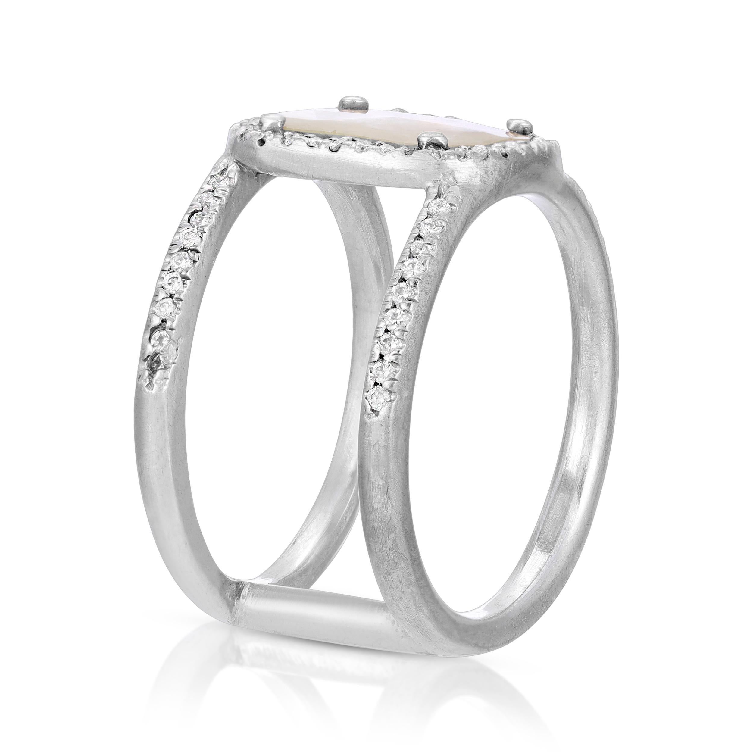 1.96ct Clear and Black Diamond Slice with .51ct vs quality Diamond Pave in 18k White Gold with Diamond Pave Double Bands.  Diamond Pave goes 1.3 around the bands with Diamond Pave stabilizing bar in the back of the ring.  size 6 1/2. All Diamonds