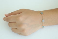 Bracciale tennis a catena con topazio blu chiaro da 12,25 carati in oro 18k