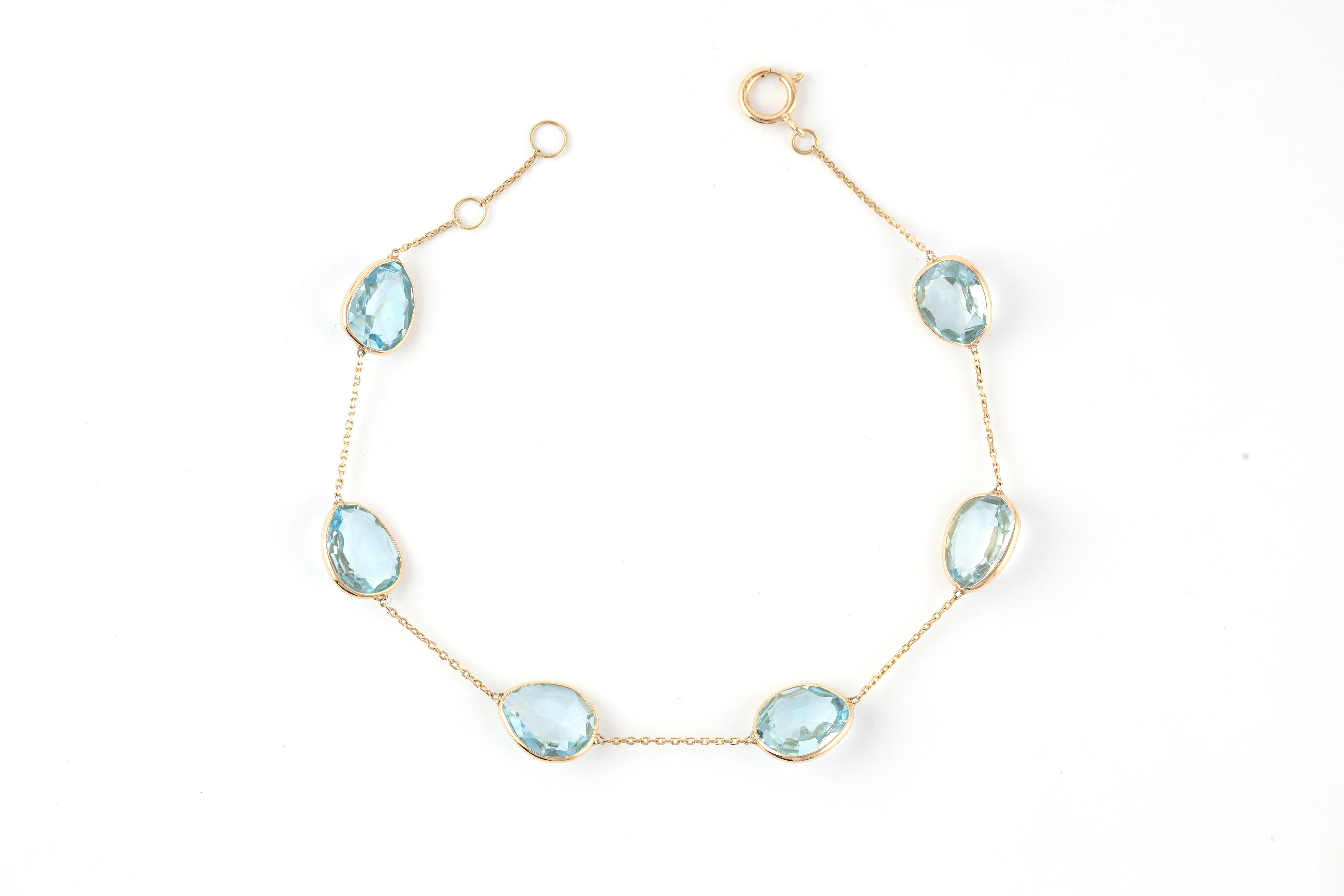 Modernist Clear Blue Topaz 12.25 Carat Chain Tennis Bracelet in 18k Gold For Sale