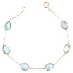 Clear Blue Topaz 12.25 Carat Chain Tennis Bracelet in 18k Gold