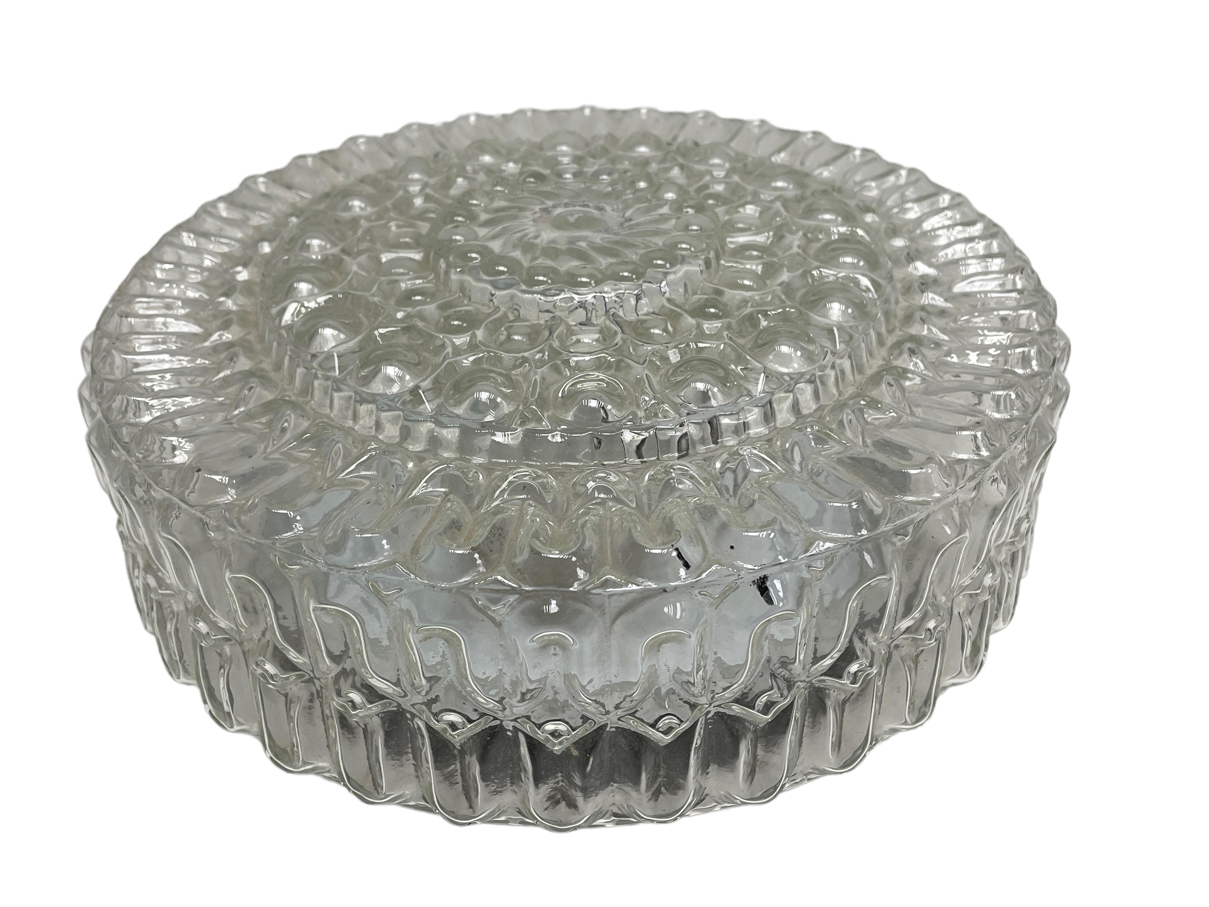 Beautiful bubble glass pattern flush mount. Made in Germany, Massive Leuchten. Gorgeous textured glass flush mount with metal fixture. The fixture requires one European E27 Edison or Medium bulb up to 60 watts. A nice addition to any room.