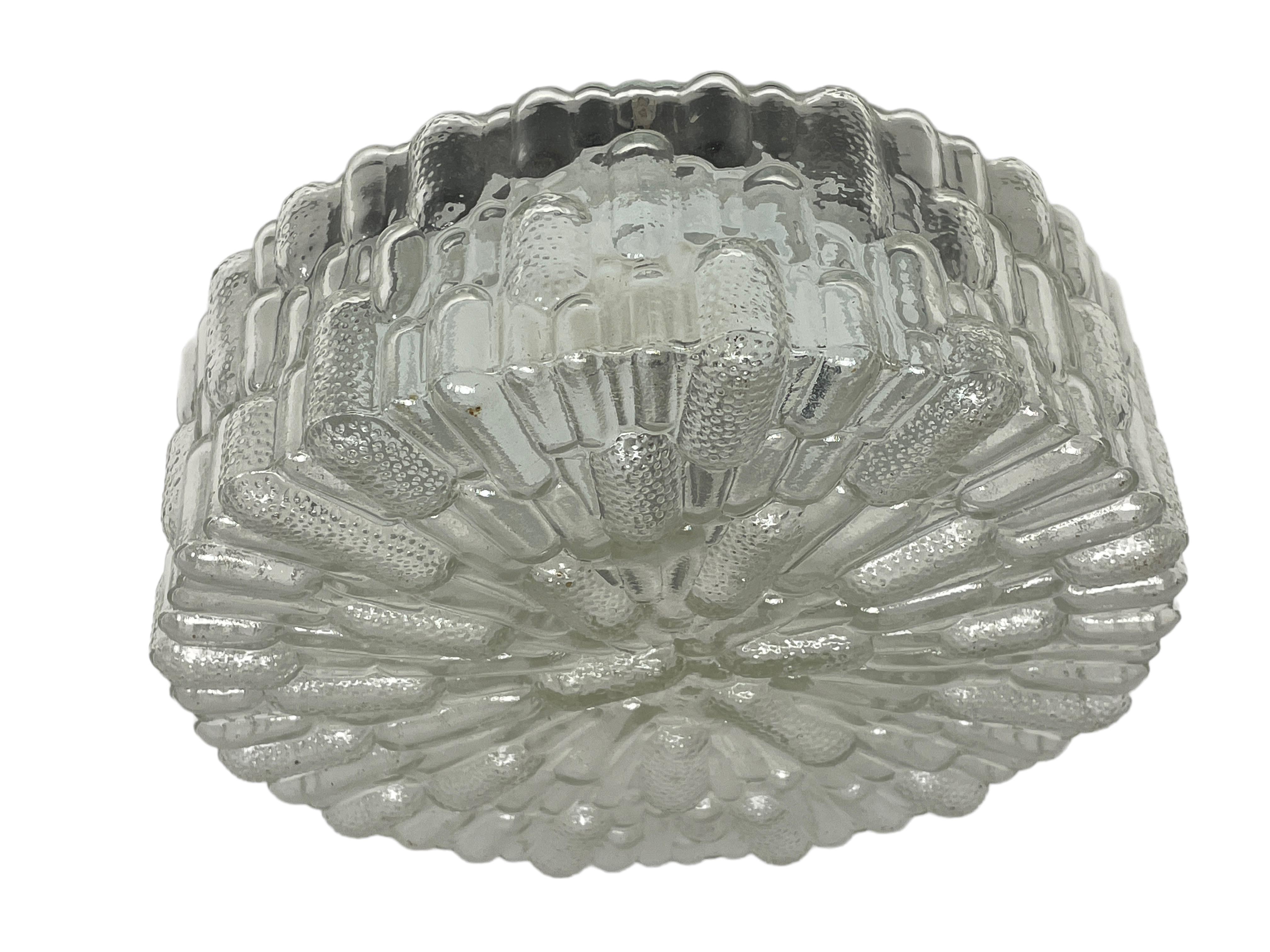 Beautiful bubble glass pattern flush mount. Made in Germany, Massive Leuchten. Gorgeous textured glass flush mount with metal fixture. The fixture requires one European E27 Edison or Medium bulb up to 60 watts. A nice addition to any room.