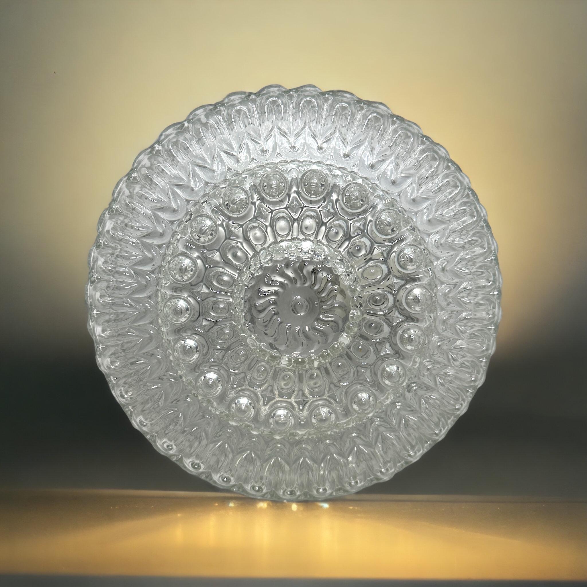 Beautiful bubble glass pattern flush mount. Made in Germany by Massive Leuchten. Gorgeous textured glass flush mount with metal fixture. The fixture requires one European E27 Edison or Medium bulb up to 60 watts. A nice addition to any room.