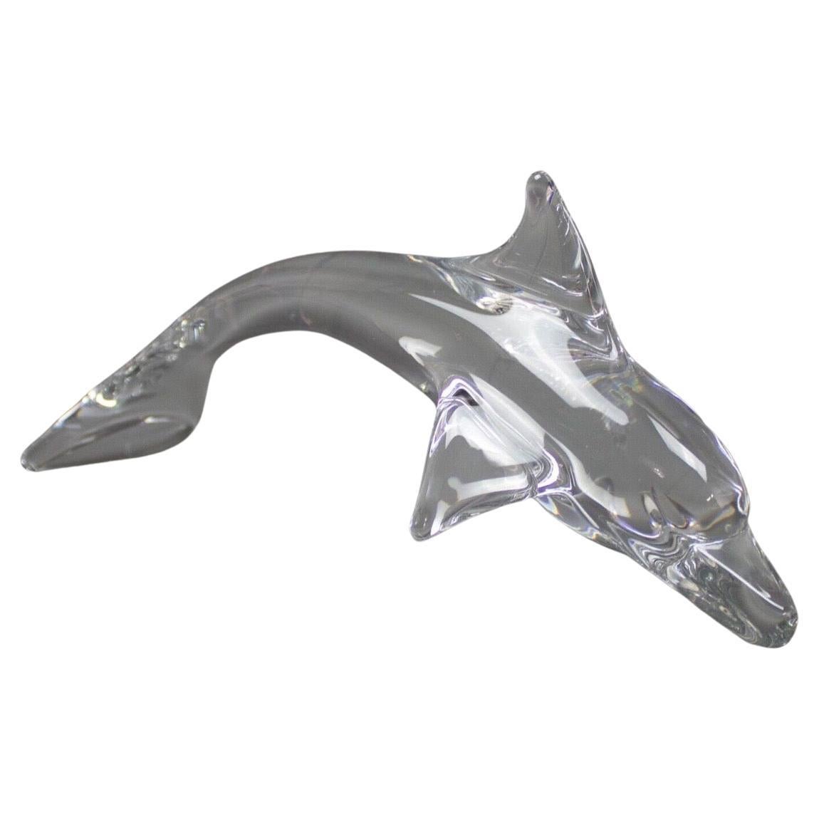 Beautiful clear crystal art glass dolphin sculpture by Daum of France, circa 1980s. The piece is in very good vintage condition with no chips or cracks and measures 13
