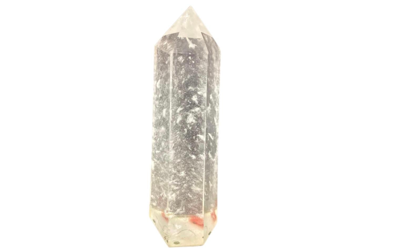 Beautiful clear quartz crystal obelisk. Clear quartz is thought to amplify energy and thought. Obelisk contains natural occlusions, which is normal and does not indicate a defect.