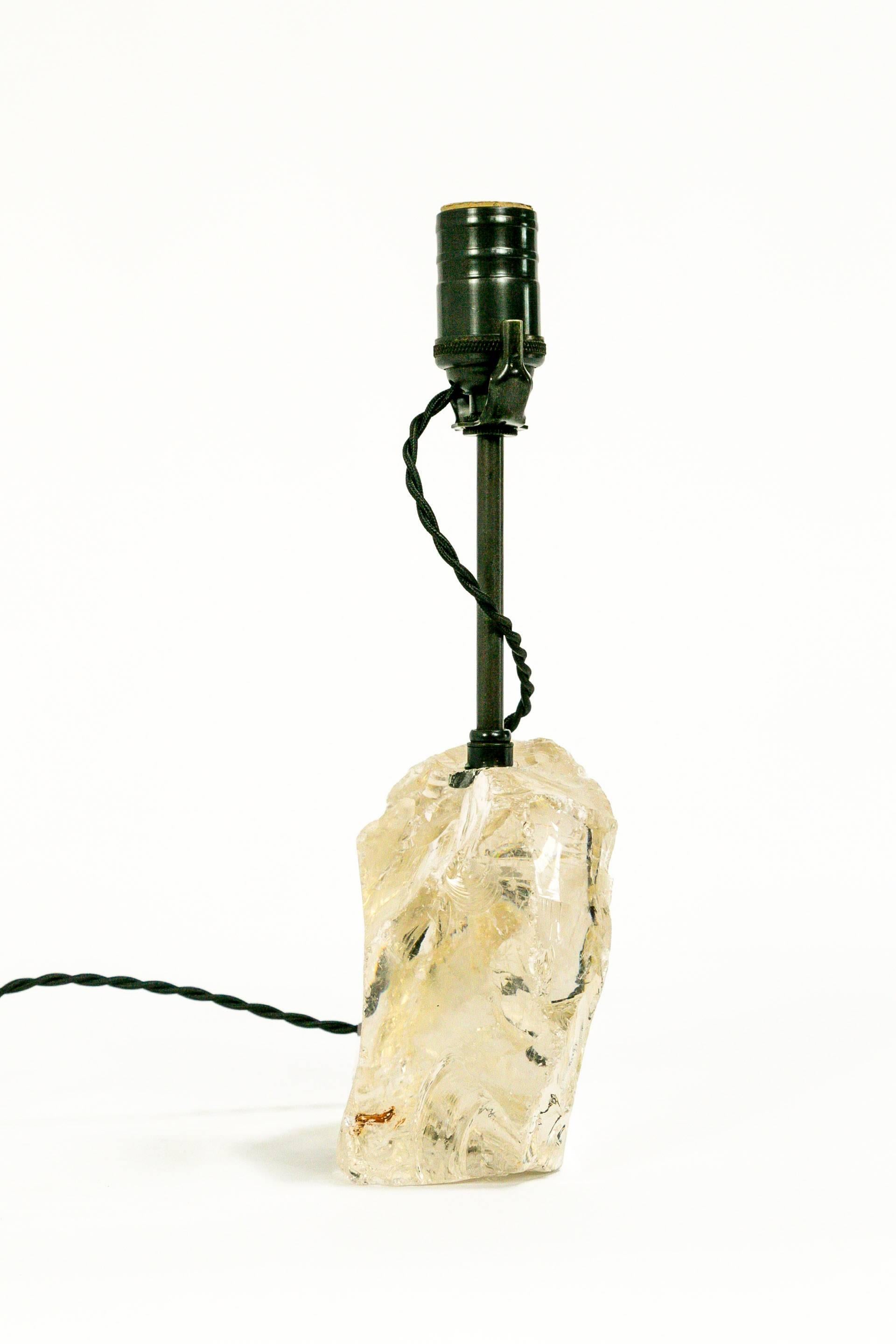 We fabricated this gorgeous, gemstone-like, warm toned, crystal clear, annealed cullet glass into a French wired table lamp. It's brass parts have an oil rubbed bronze finish, with a twisted, black, rayon covered cord with an inline switch. Measure: