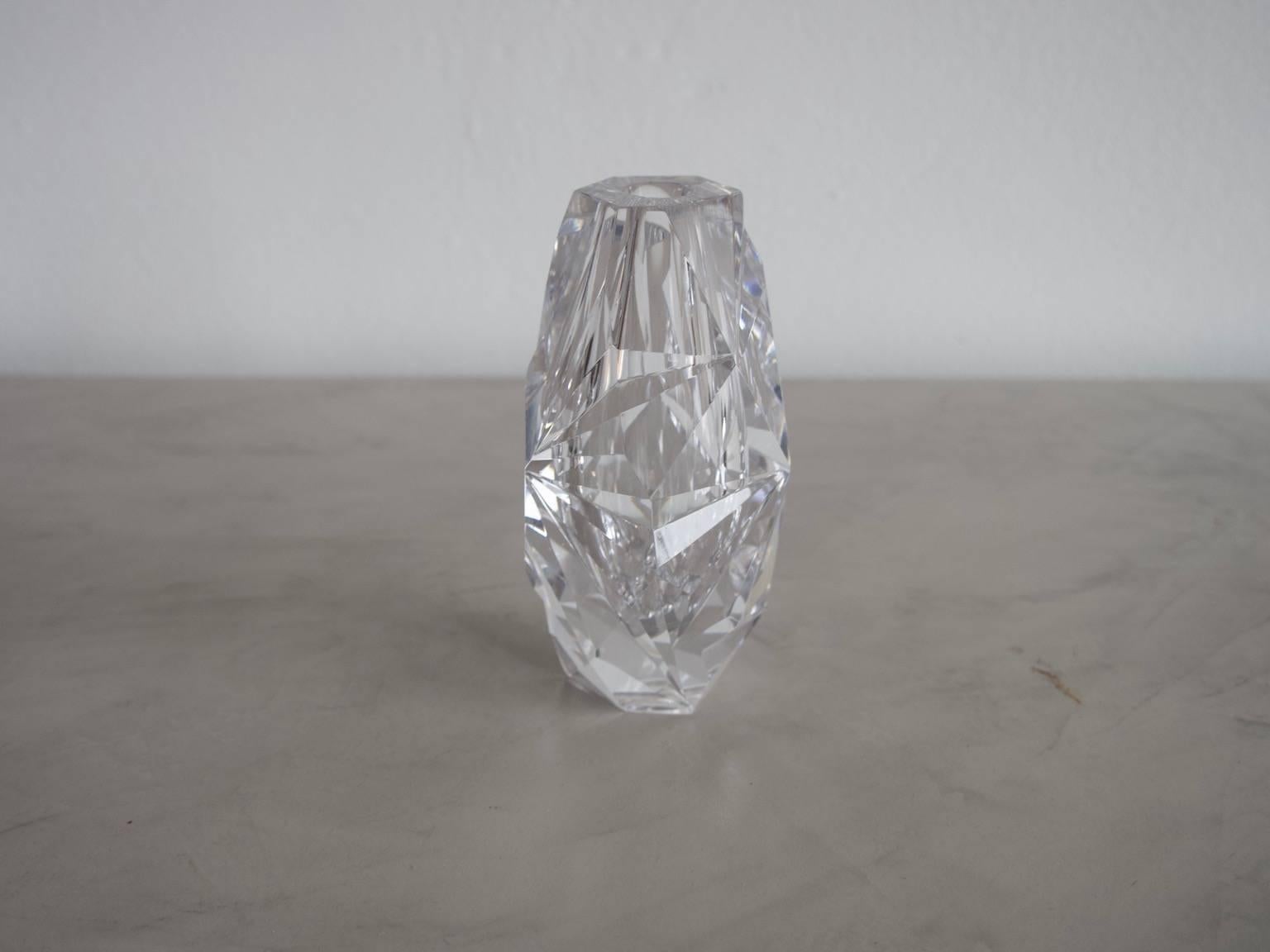 Colorless glass vase with cut decoration designed by Vicke Lindstrand and manufactured by Kosta, Sweden. Ovoid shape. Engraved on the bottom: Kosta 42769 Lindstrand.
