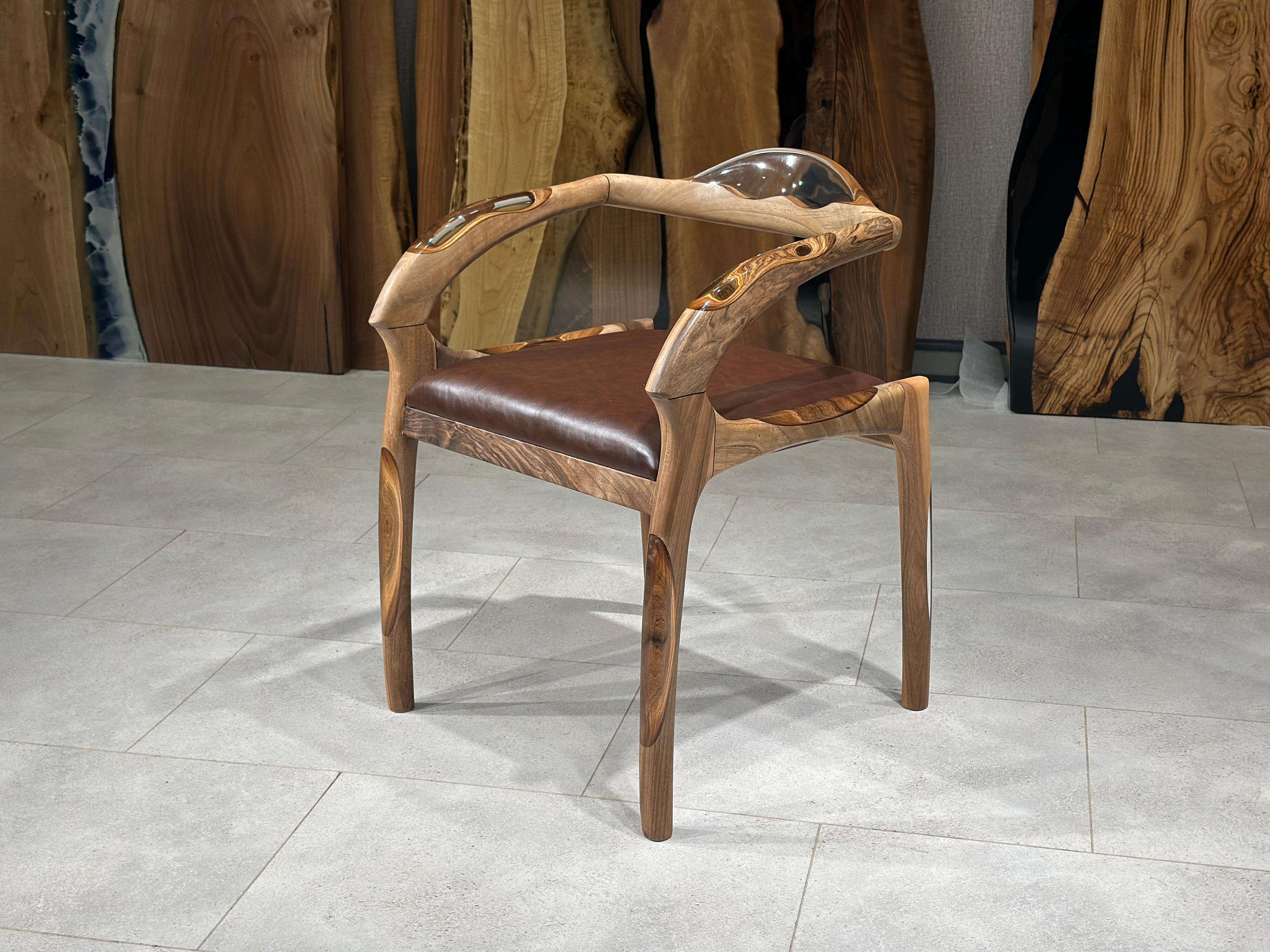 WALNUT EPOXY CHAIR


Check out our Walnut Wood & Epoxy Chair – a sturdy and good-looking seat for your place. It's made with strong walnut wood that has cool patterns. 

This chair is made of solid walnut wood & epoxy resin. Epoxy colour can be made
