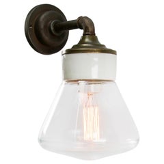 Luci da parete con braccio in ghisa vintage in ottone con vetro trasparente