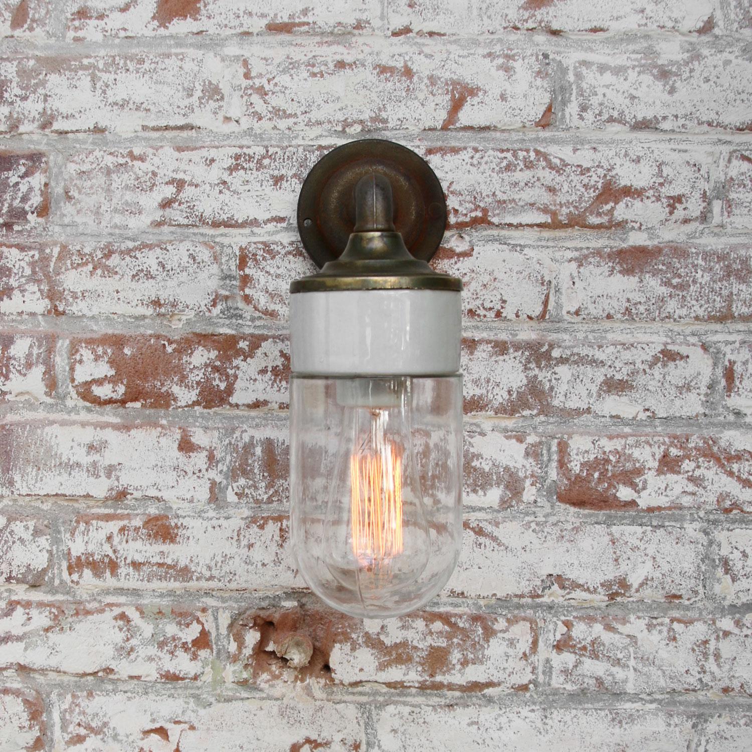 Industrial Clear Glass Brass Vintage Cast Iron Arm Scones Wall Lights For Sale