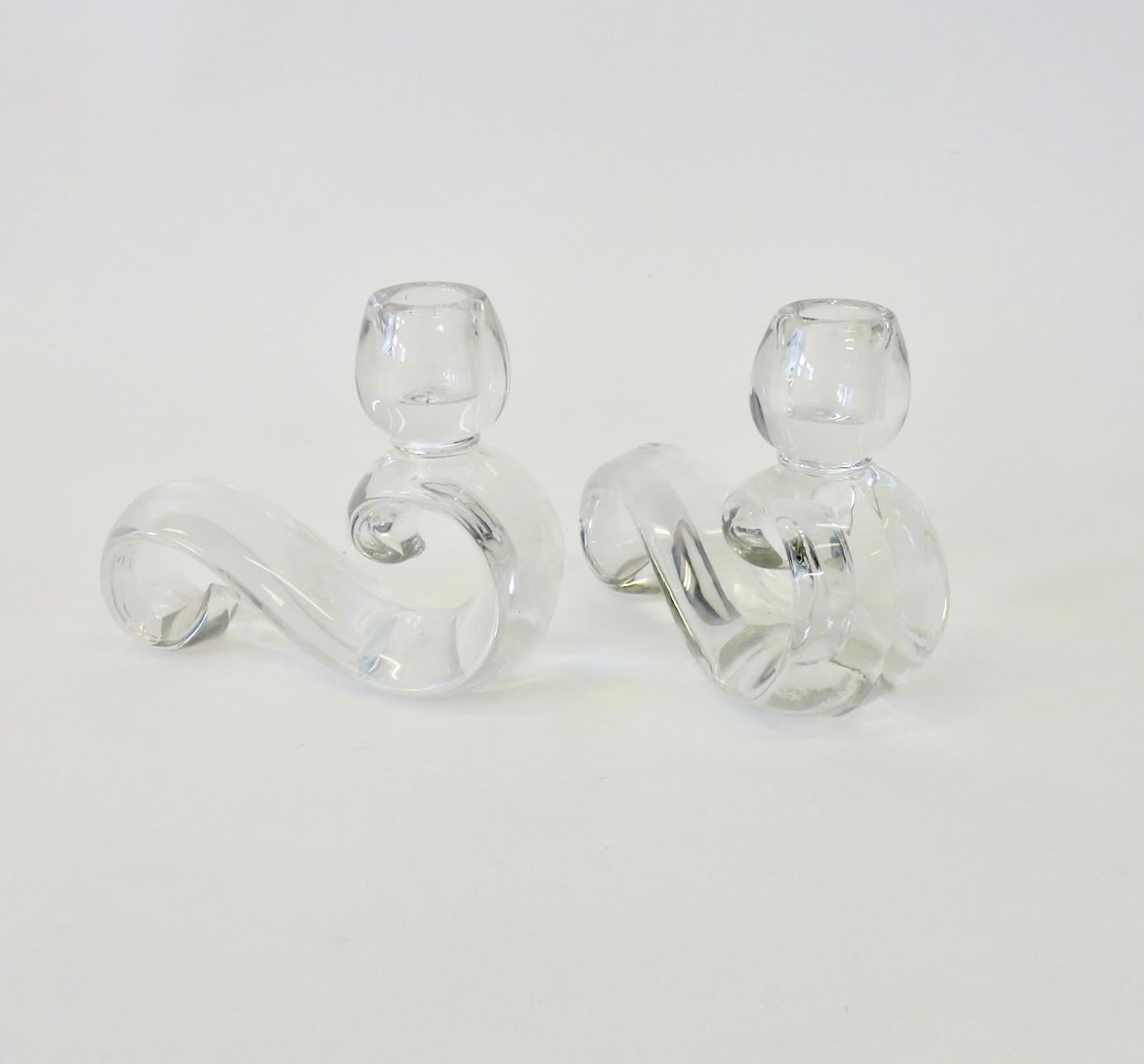 Pair of low crystal glass candlesticks.