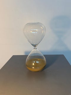Clear Glass Hourglass with Gold Sand and a Sculptural Heart-Shaped Design