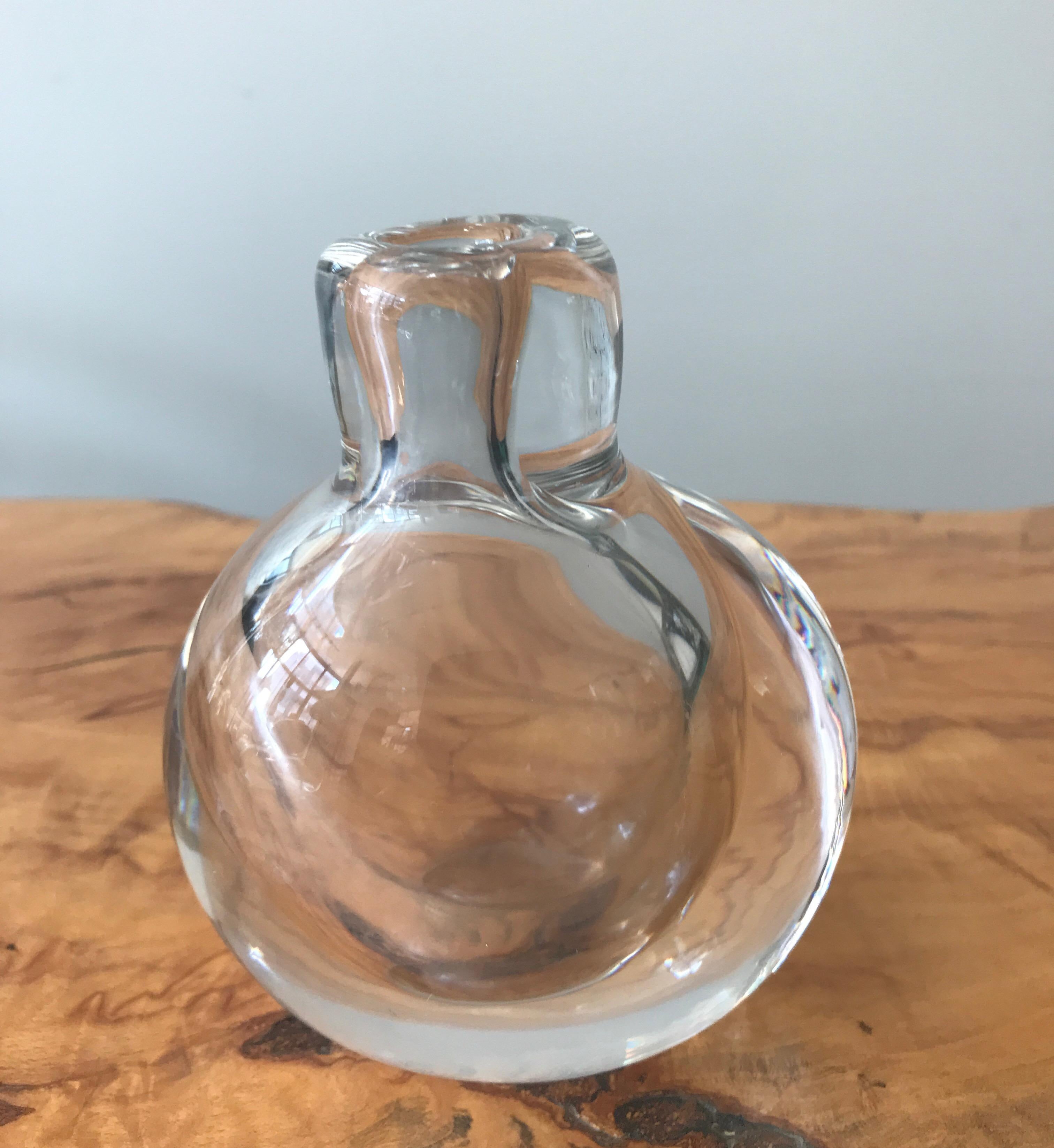 Handblown thick clear glass Kosta Boda vase by pioneering Swedish art glass
Master Vicki Lindstrand.
The ovoid vase has thick artfully formed asymmetrical walls.
Signed on the bottom.