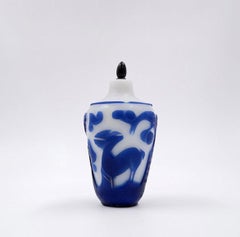 Clear glass snuff bottle with blue overlay, China 19th century