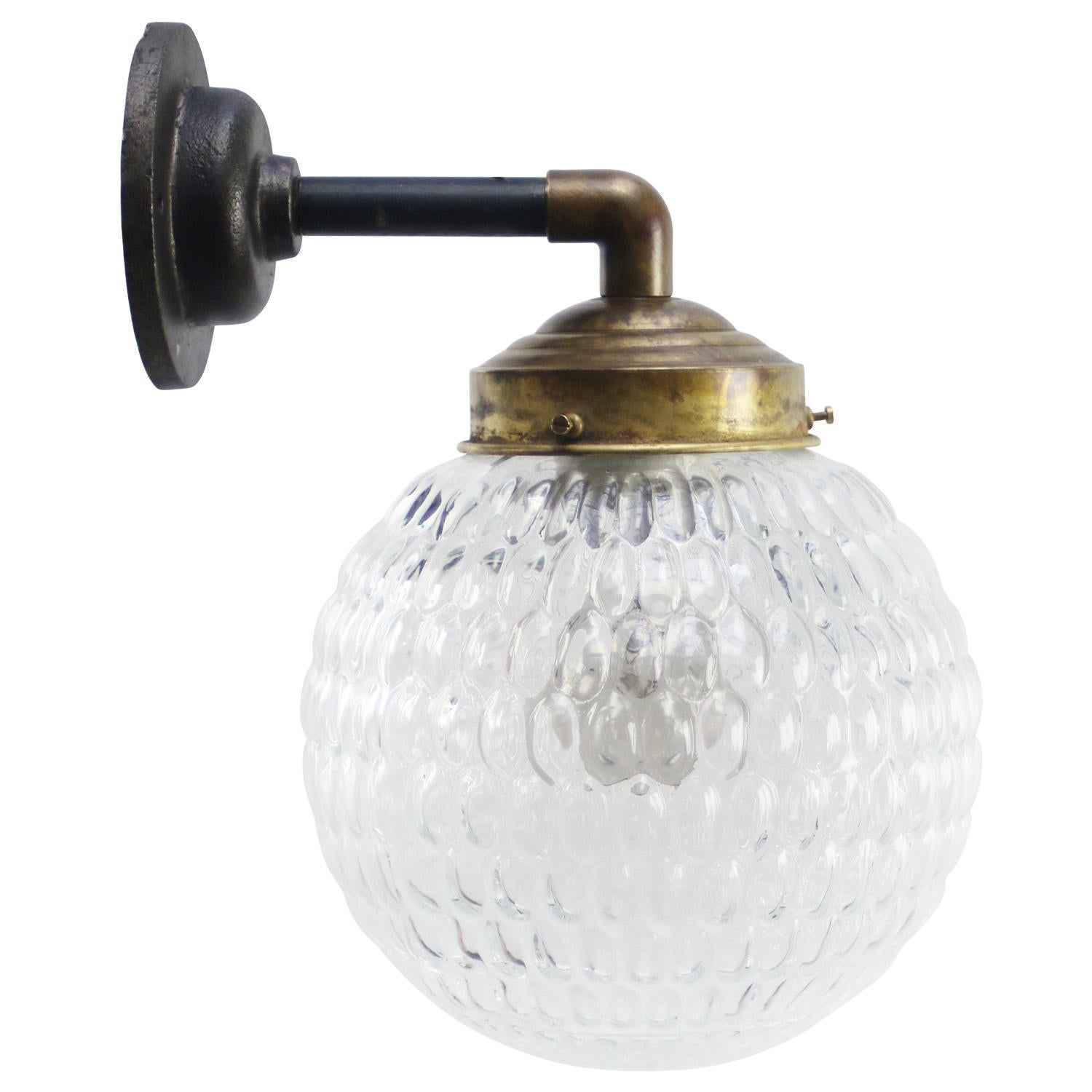 Brass and cast Iron Industrial wall light
clear bubble glass globe

Diameter cast iron wall piece: 10.5 cm / 4”, 2 holes to secure

Weight: 2.50 kg / 5.5 lb

Priced per individual item. All lamps have been made suitable by international standards