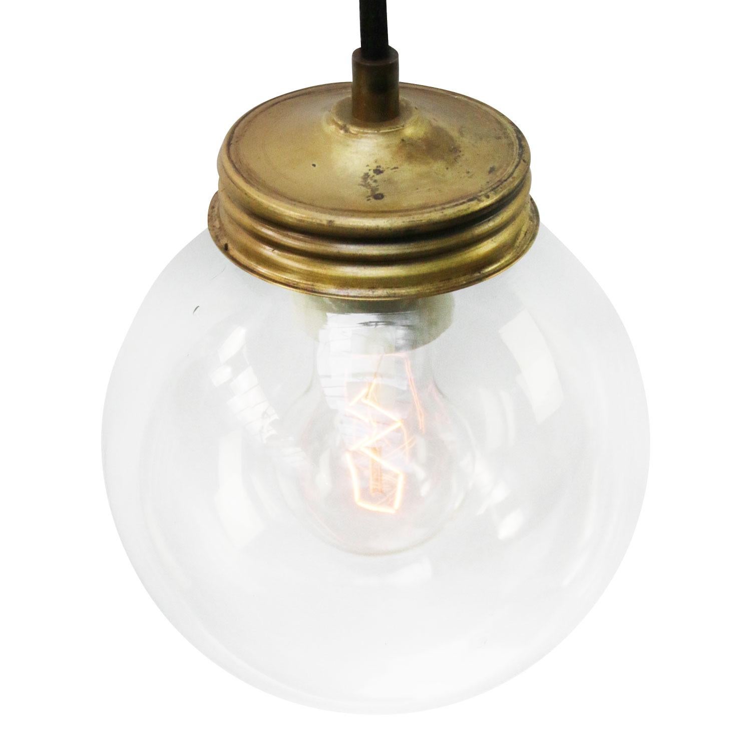 Vintage mid-century brass hanging lamp.
Brass and round clear glass.
3 conductors, including ground wire.

Weight: 0.80 kg / 1.8 lb

Priced per individual item. All lamps have been made suitable by international standards for incandescent