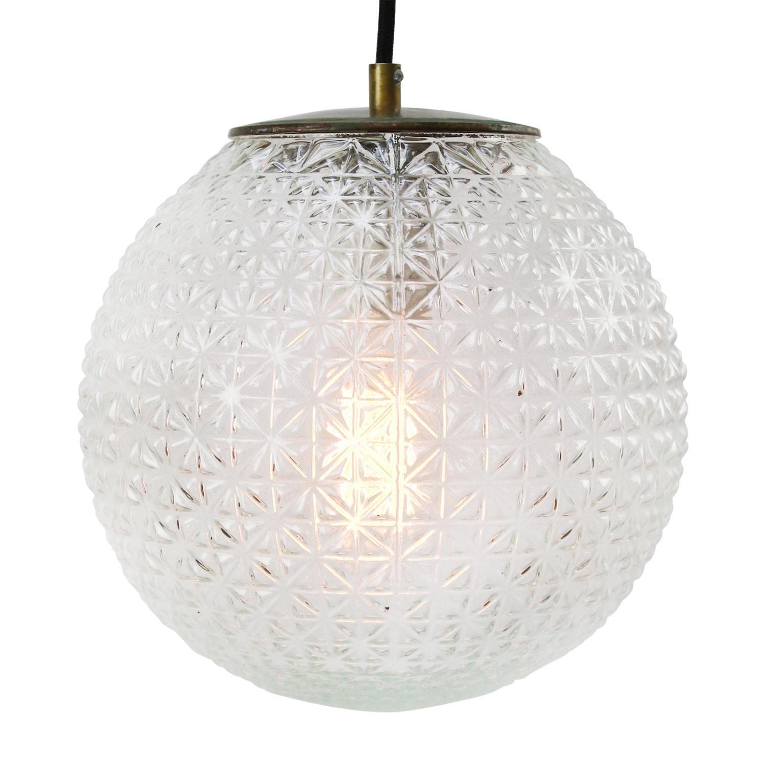 Clear texture glass pendant with brass top
2 meter black wire

Weight: 2.50 kg / 5.5 lb

Priced per individual item. All lamps have been made suitable by international standards for incandescent light bulbs, energy-efficient and LED bulbs.