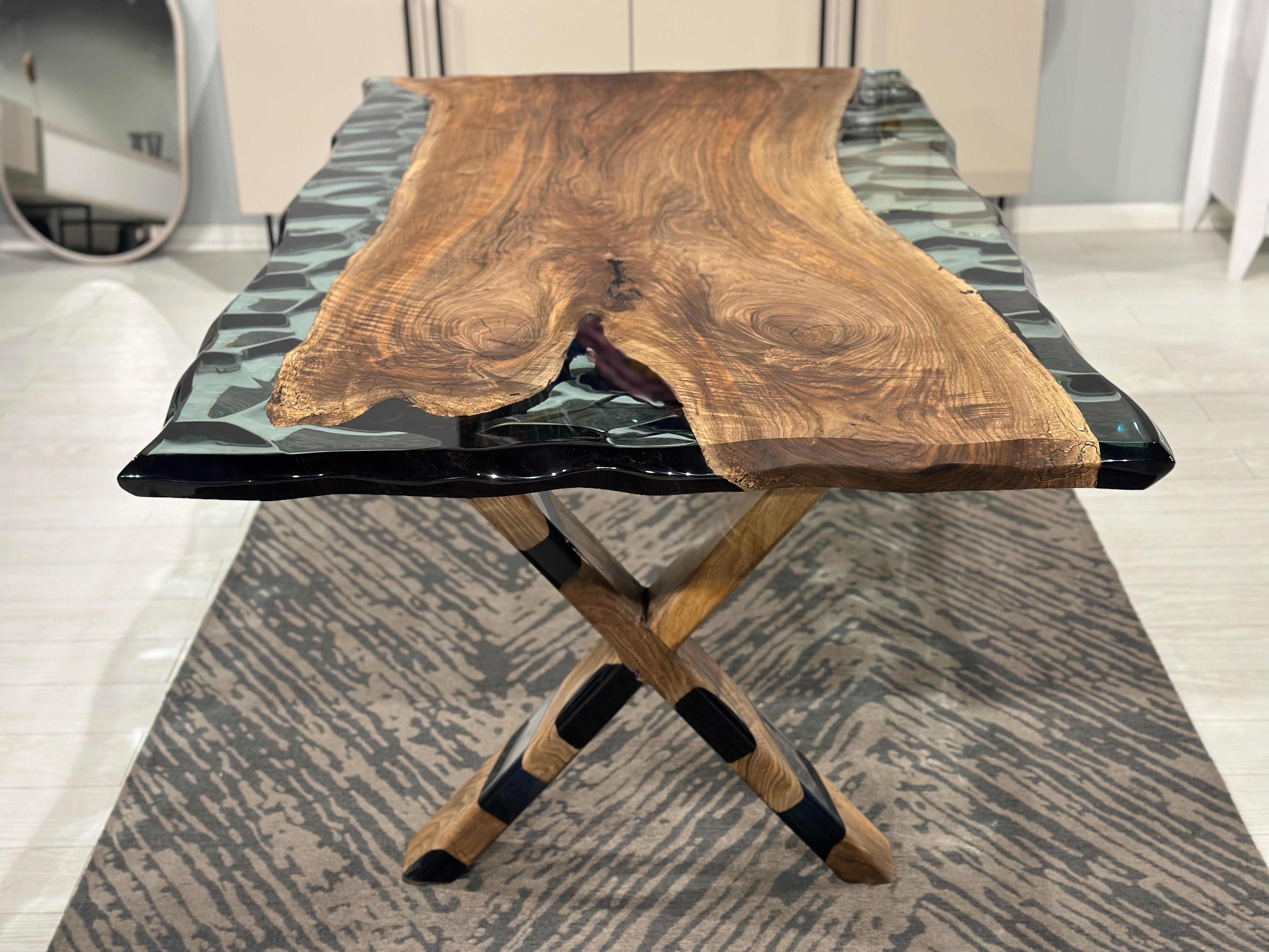 Chestnut Wood Wave Epoxy Resin Dining / Conference Table

This table is made of one-piece natural walnut slab. We brought together green transparent epoxy with the unique structure of the walnut slab.

It can be made in any size you wish! 