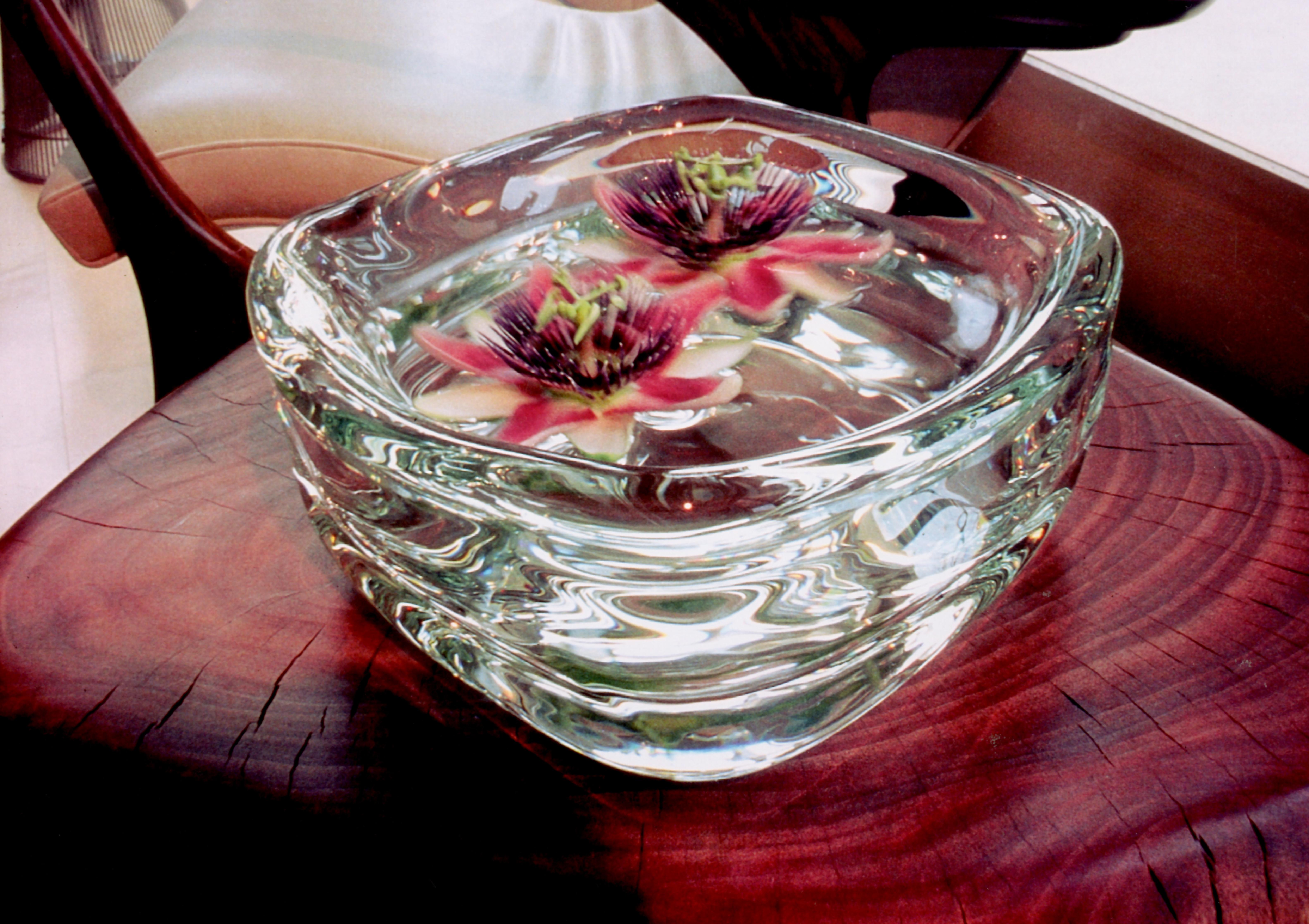 Modern glass bowl • Clear Happy bowl by Siemon & Salazar
Measures: 5” T x 8” W. Each piece is handmade to order.

These works are a departure from the careful shapes of the banded vessels. They are reminiscent of another era and play with the
