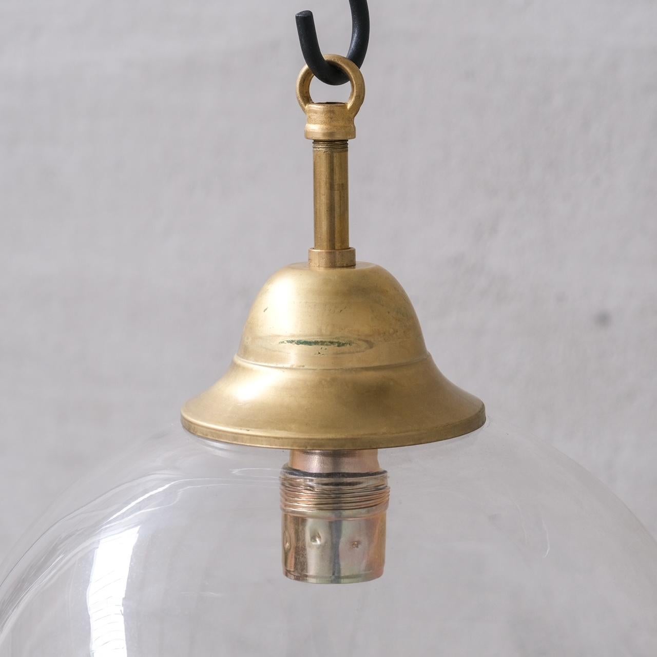 Clear Italian Mid-Century Glass and Brass Pendant Lights (15 available) For Sale 1