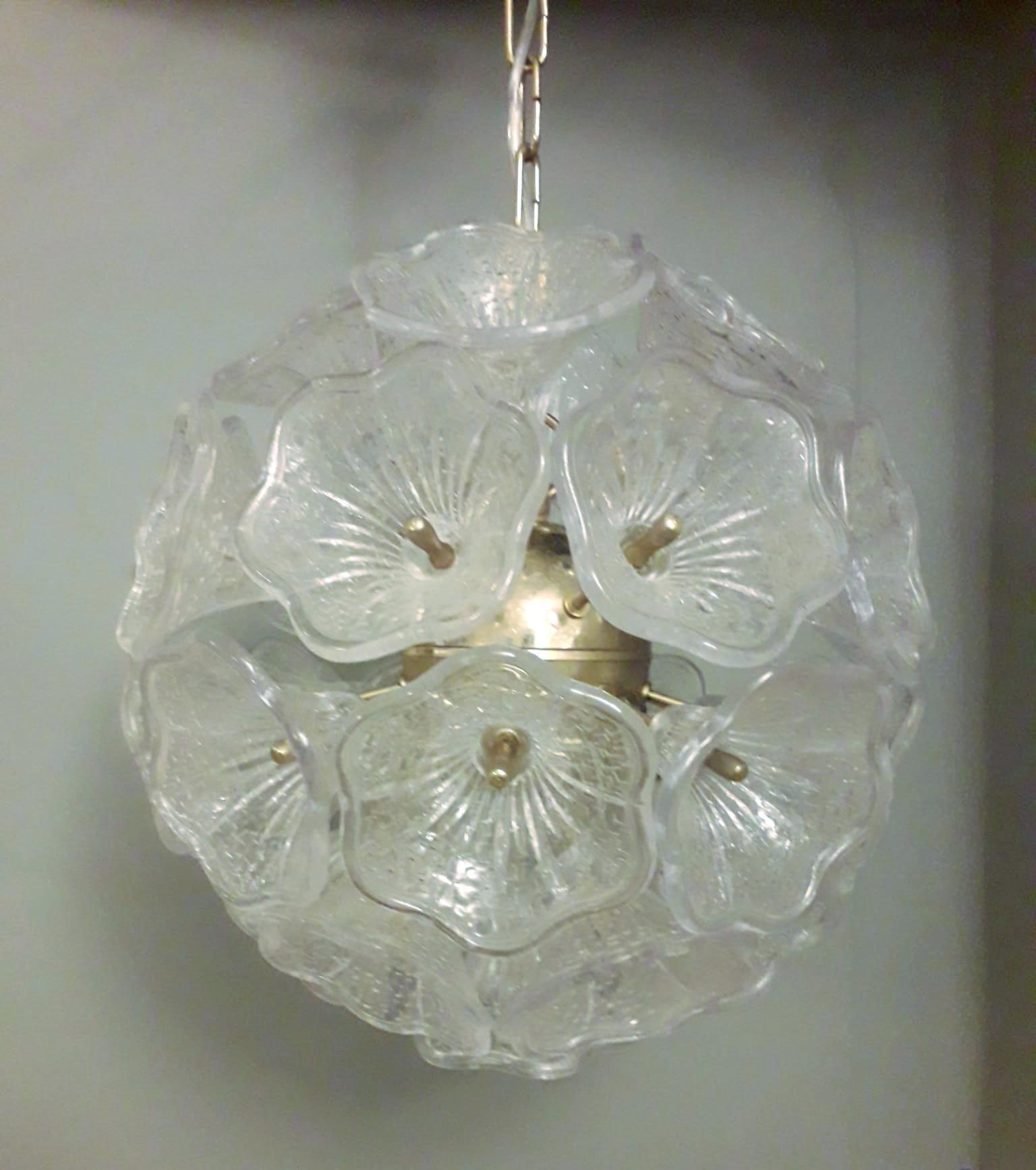 Vintage Italian sputnik chandelier with clear Murano flowers on brass frame / Made in Italy by Venini, circa 1960s
6 lights / E12 or E14 type / max 40W each
Diameter: 16 inches, height: 16 inches, total height 26 inches including chain and