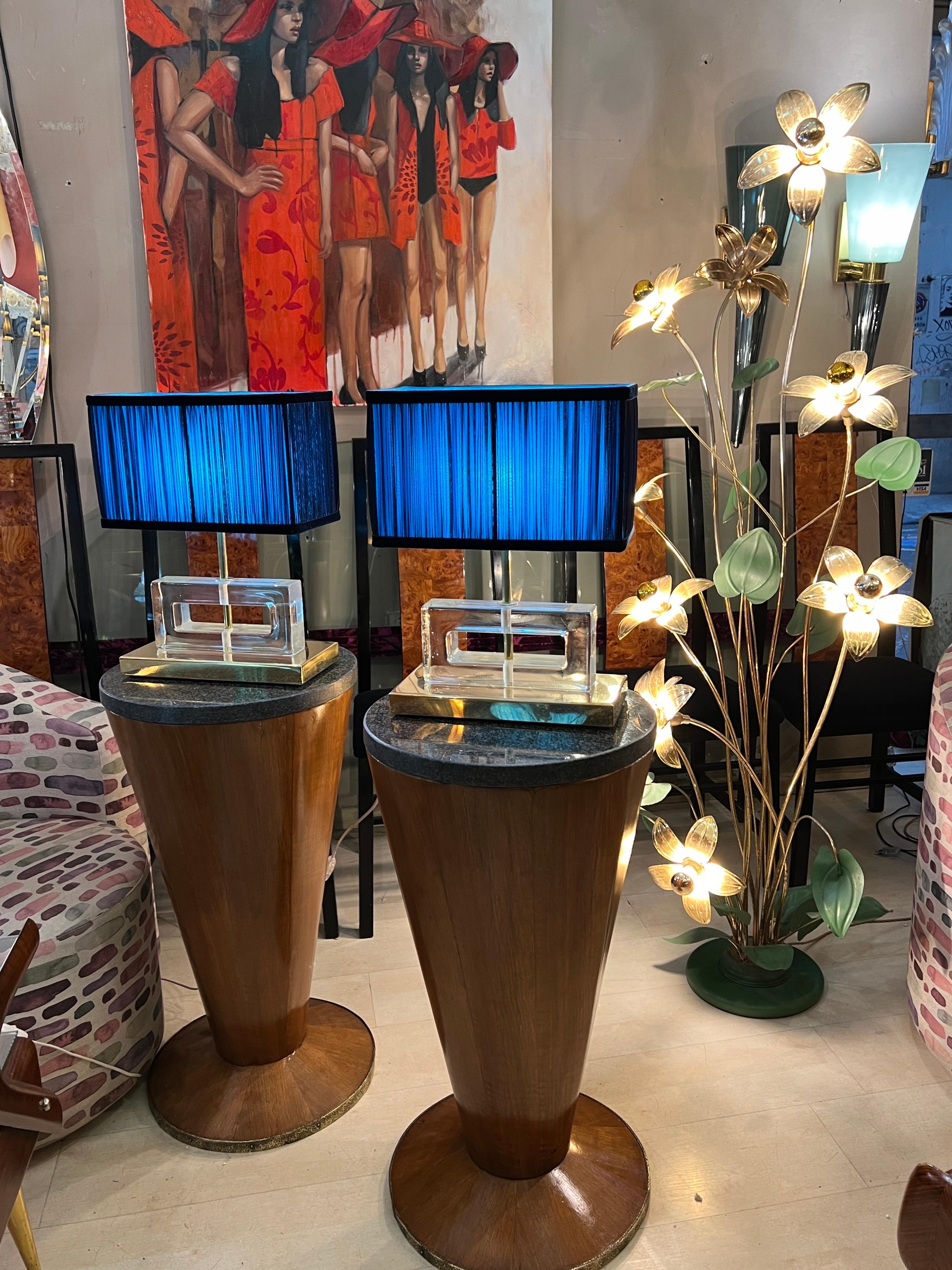 Clear Murano glass blocks lamps ice effect with brass base and our hand sewn blue and turquoise lampshades.
The geometric clear glass blocks are solid, thick and heavy.
The double color lampshades are handmade in our internal laboratory using