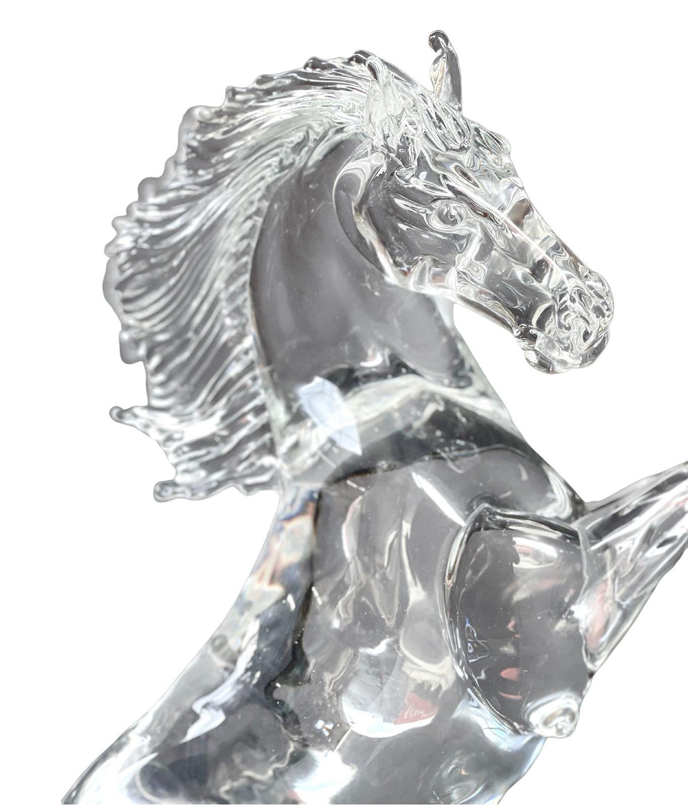 Clear Murano glass sculpture depicting a rearing horse by Arnaldo Zanella (signed). 
Dimensions:
23.5