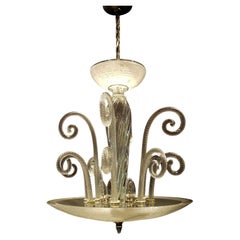 Lustre en forme de boule nervurée à boucles torsadées en Murano clair
