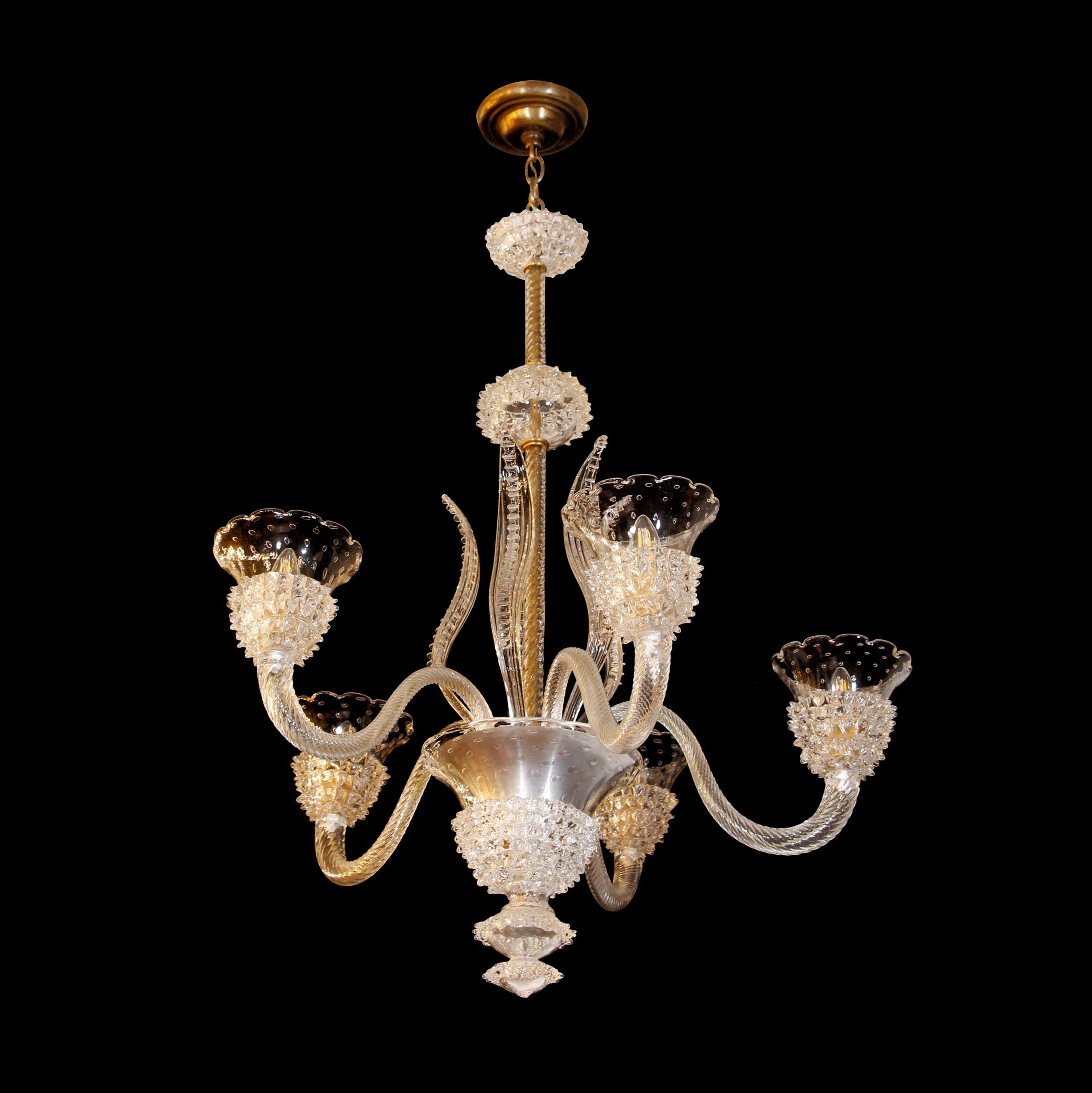 20th Century clear hand blown and hand formed Murano glass chandelier. Featuring a floral design with five arms and control bubble rostrato glass bowls hanging from a brass chain and canopy. Cleaned and rewired. Please note, this item is located in