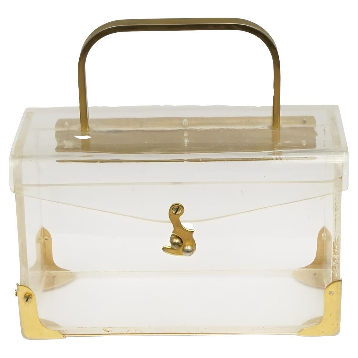 Bolso de plexiglás transparente con accesorios chapados en oro circa 1940s en venta