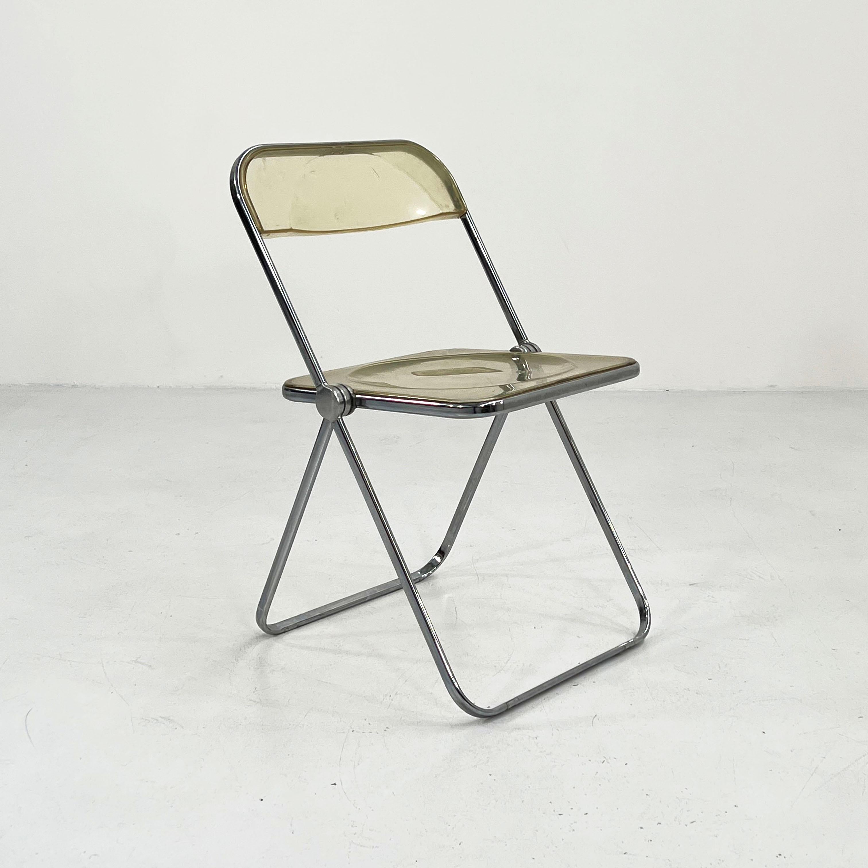 Designer - Giancarlo Piretti
Producer - Anonima Castelli
Model - Plia Chair
Design Period - Sixties
Measurements - width 46 cm x depth 50 cm x height 75 cm x seat height 44 cm
Materials - Metal, Plastic
Color - Silver, Clear

Condition -