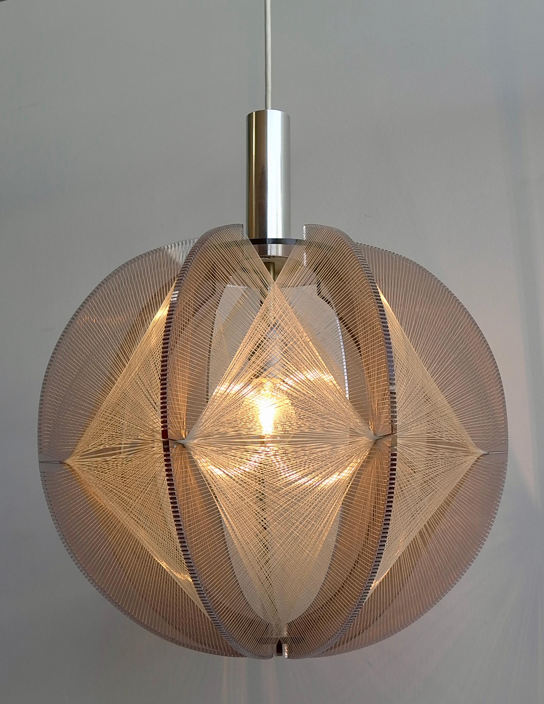 Cler Purple wire pendant lamp by Paul Secon for Sompex, 1970s

Pendant lamp is made of clear/purple Lucite with woven strings surrounding the lightbulb, gives a warm light when lit.
