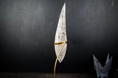 Scultura di cristallo di quarzo chiaro con fiamma